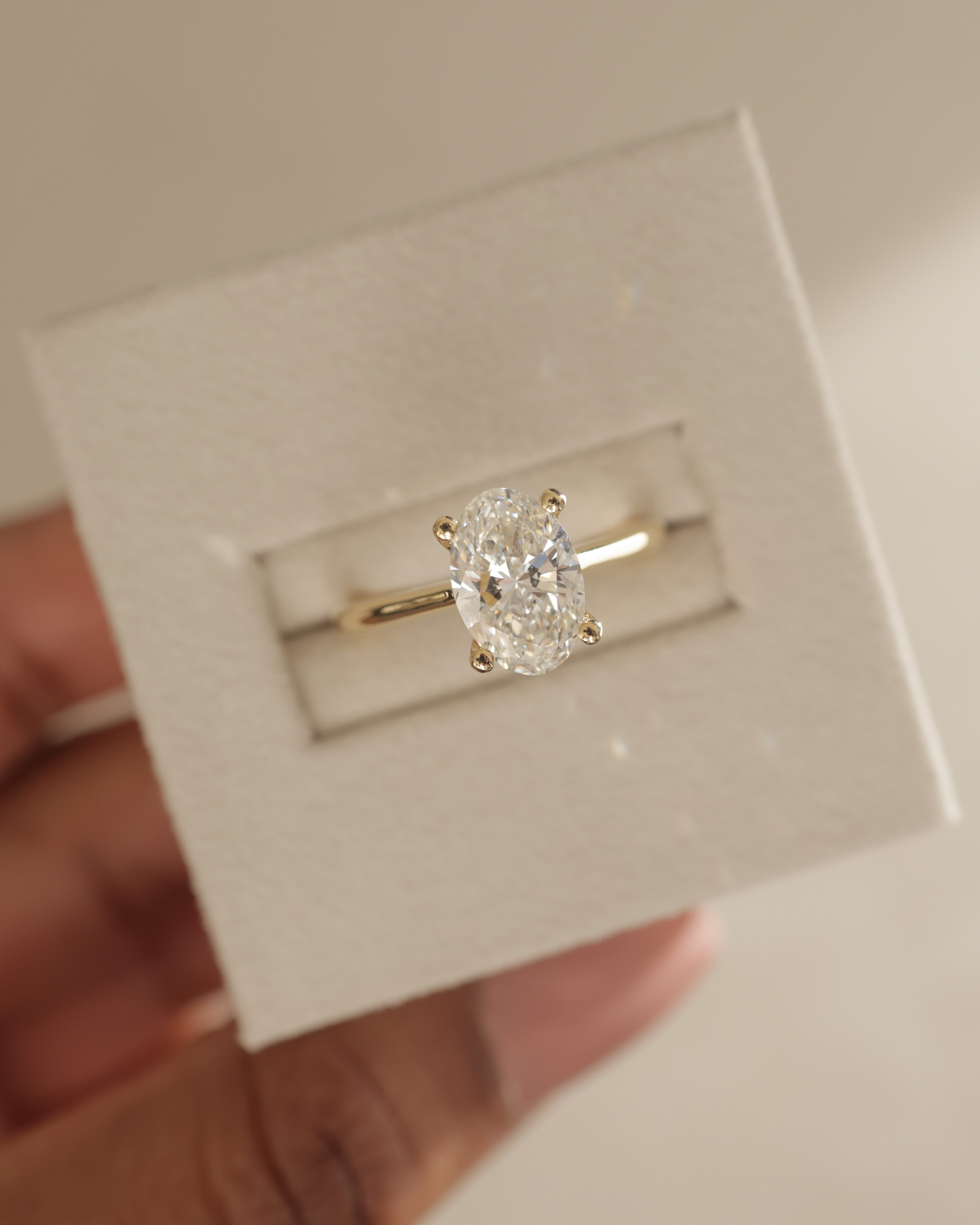 Emily - Oval Solitaire with Tapered Band Lifestyle Image