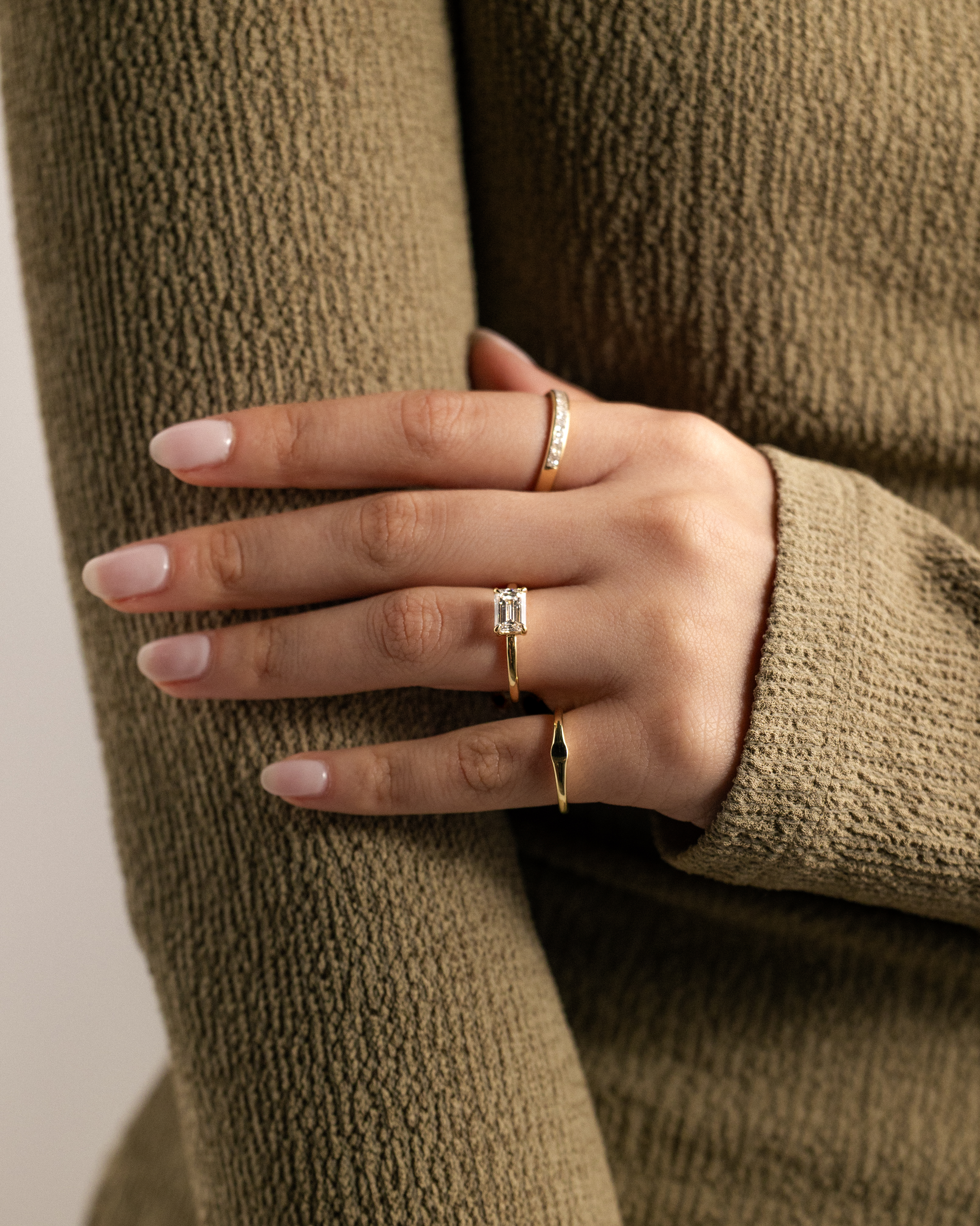 Evelyn  East West Emerald Solitaire Lifestyle Image