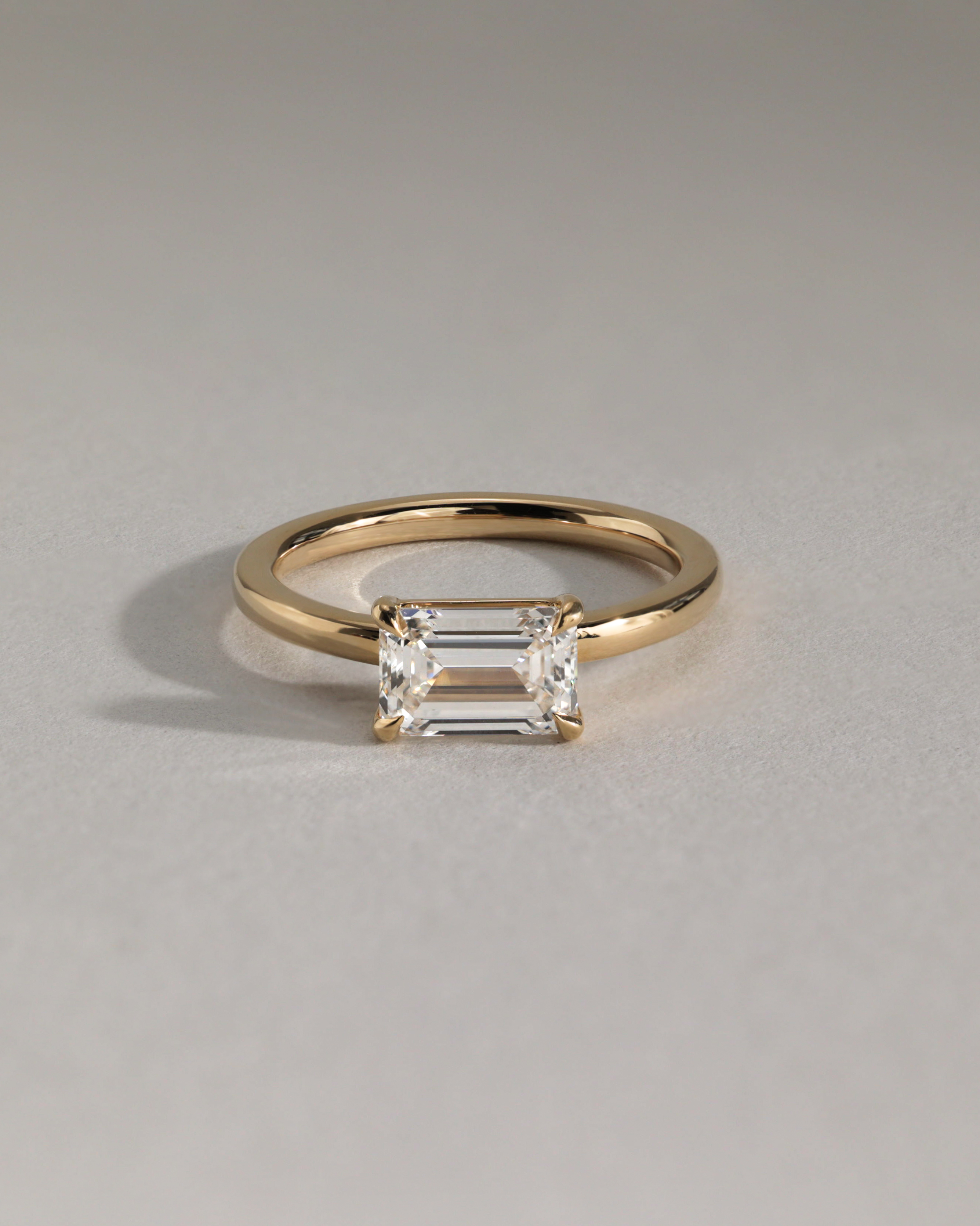 Evelyn  East West Emerald Solitaire Lifestyle Image