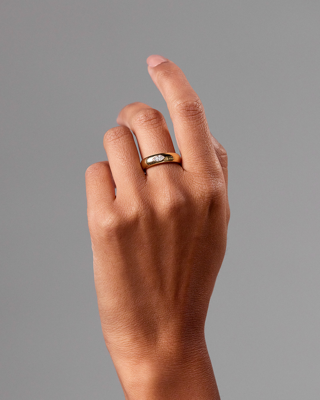 Franca - East West Marquise Smooth Dome Solitaire Lifestyle Image