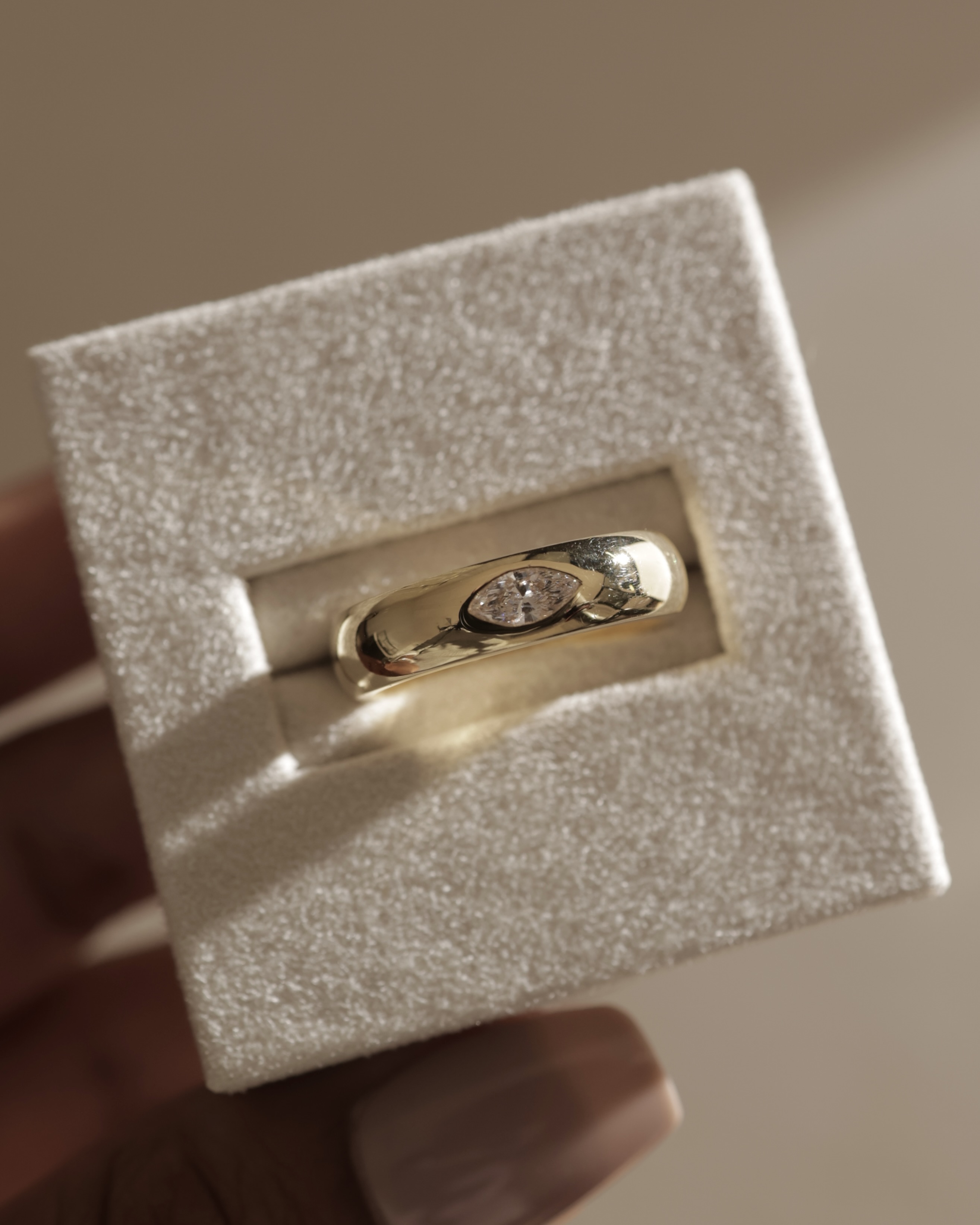 Franca - East West Marquise Smooth Dome Solitaire Lifestyle Image