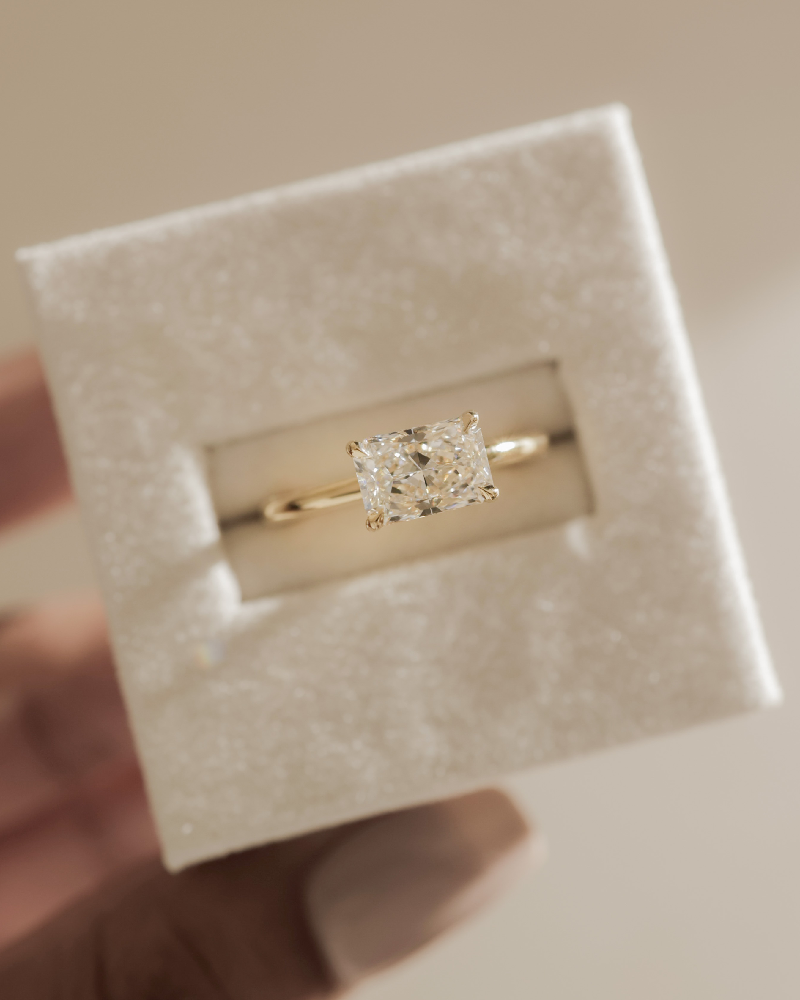 Francene - East West Radiant Solitaire with Hidden Halo Lifestyle Image