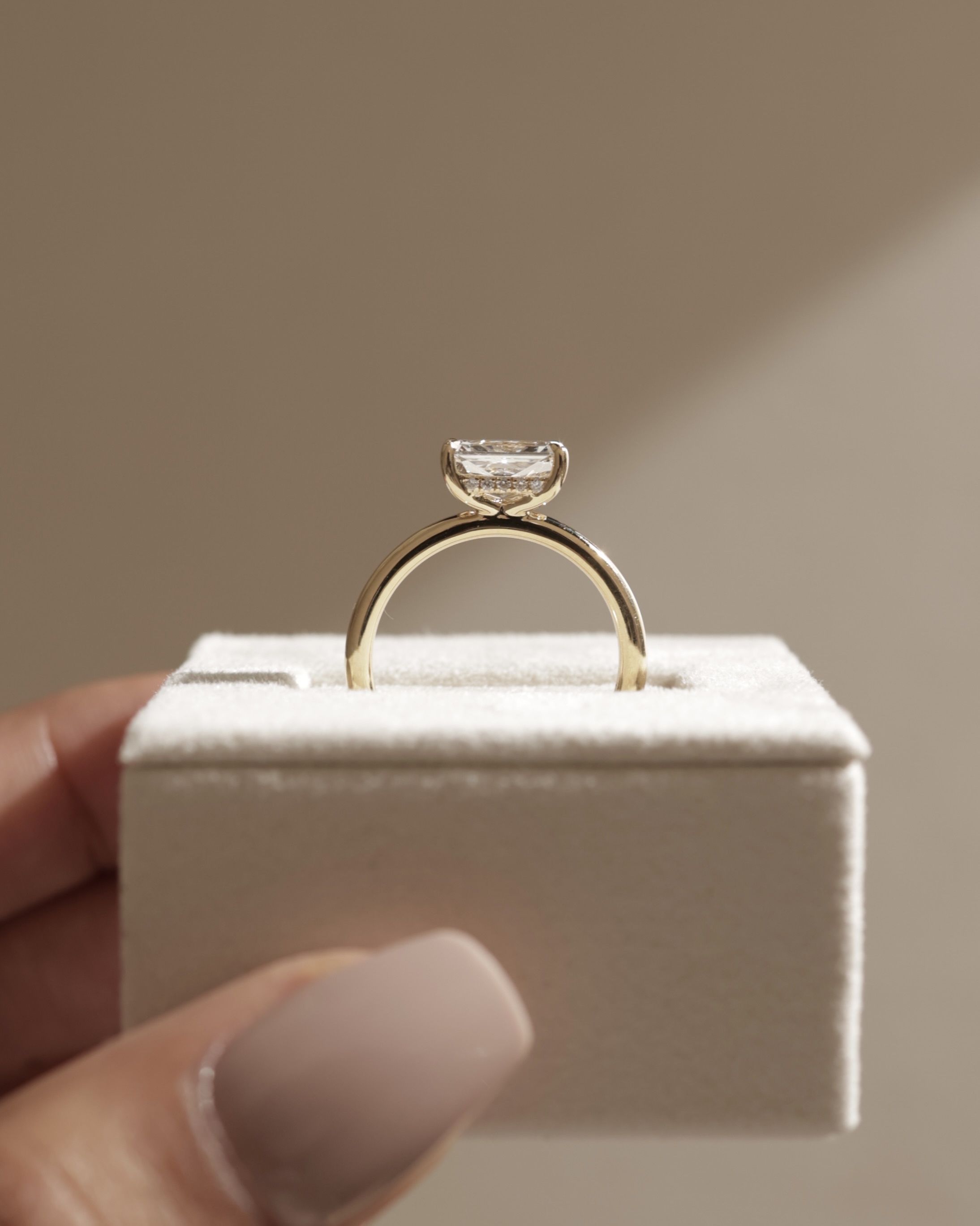 Francene - East West Radiant Solitaire with Hidden Halo Lifestyle Image