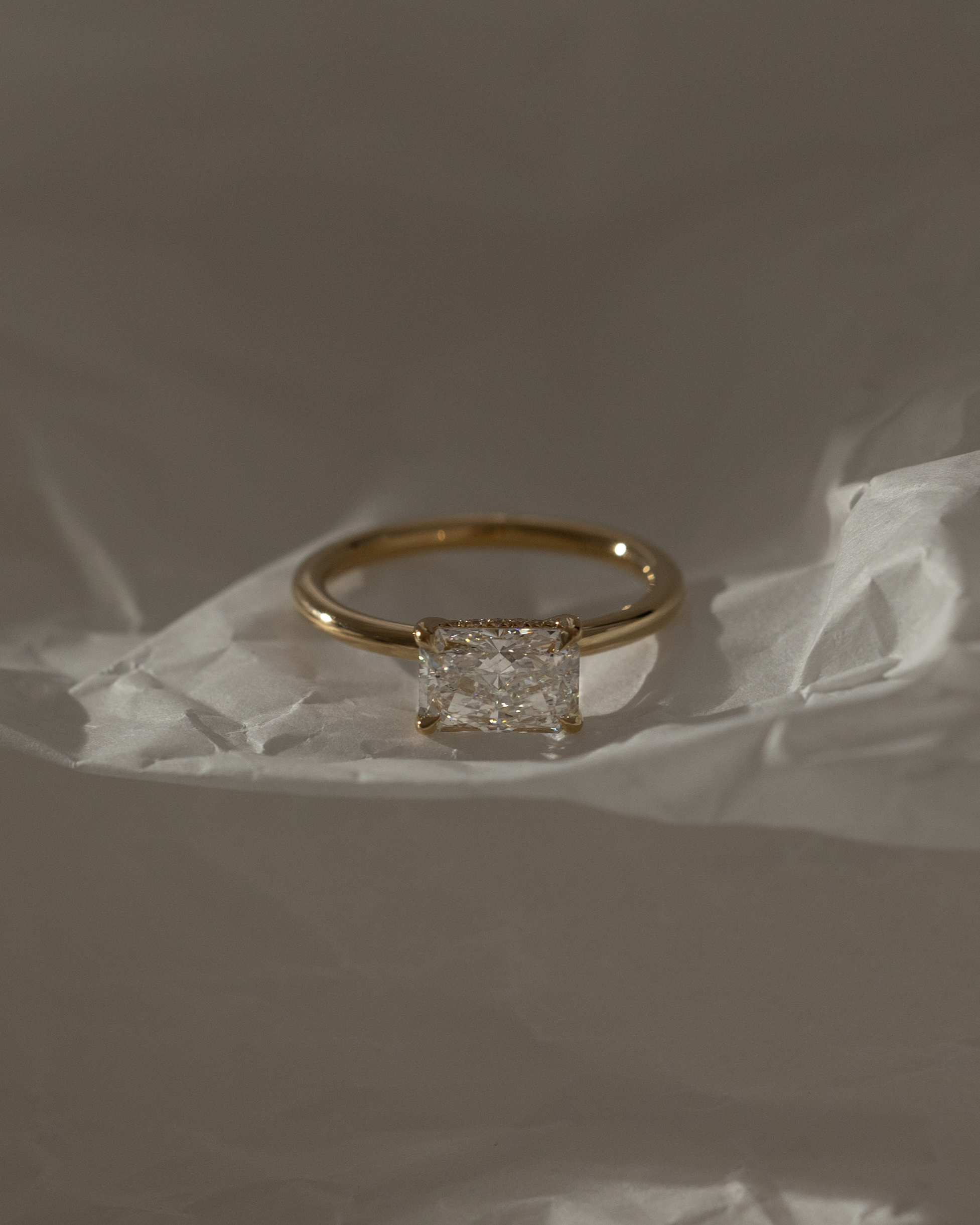 Francene - East West Radiant Solitaire with Hidden Halo Lifestyle Image