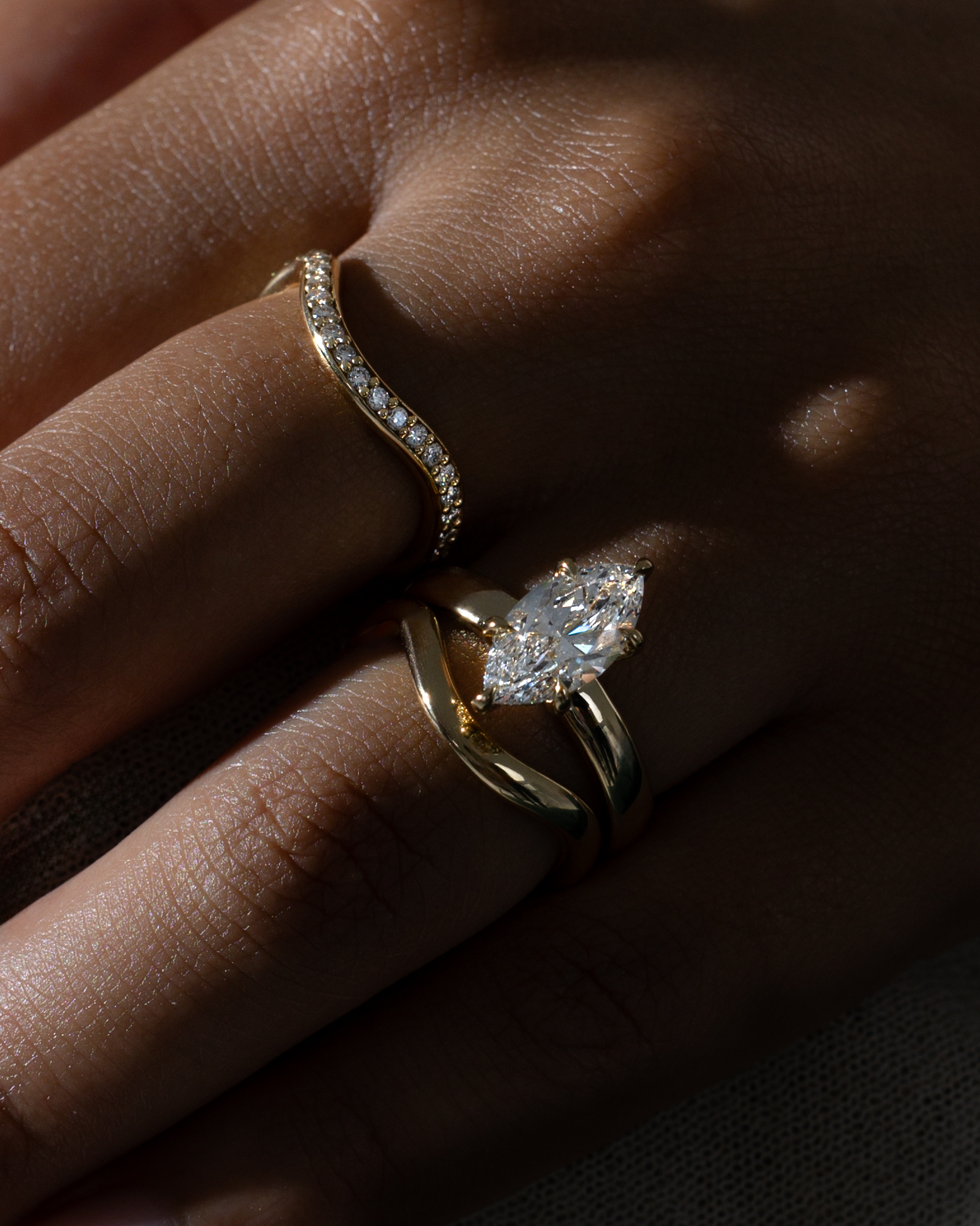 Gigi - Marquise Solitaire with Hidden Halo and Cigar Band Lifestyle Image