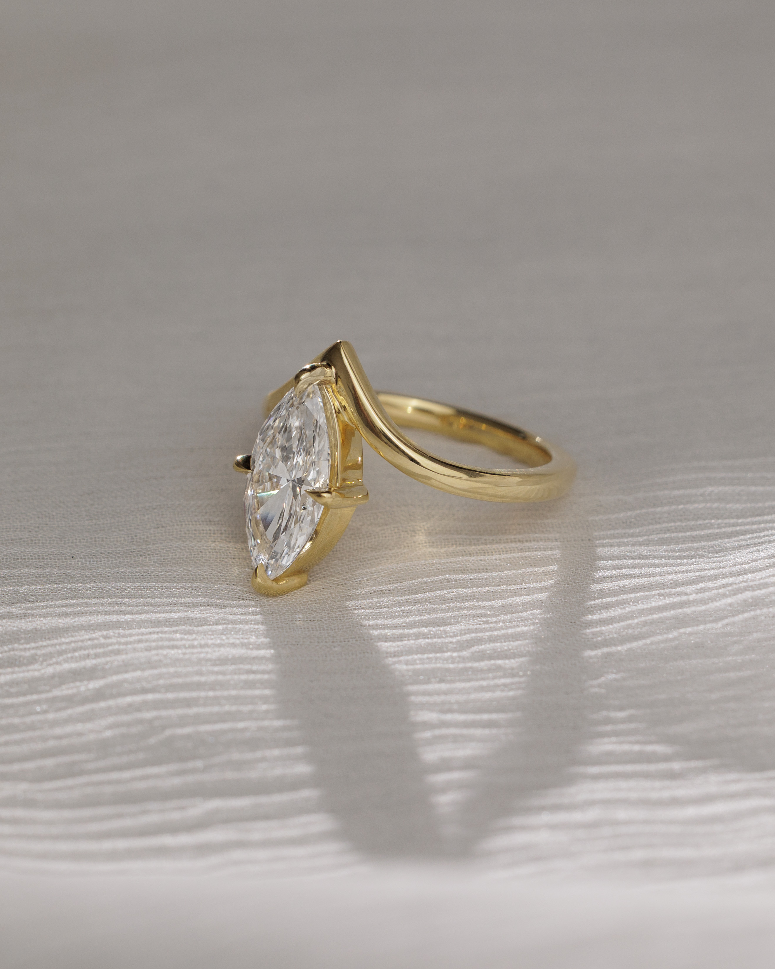 Giselle - Marquise Solitaire with Deep V Band Lifestyle Image