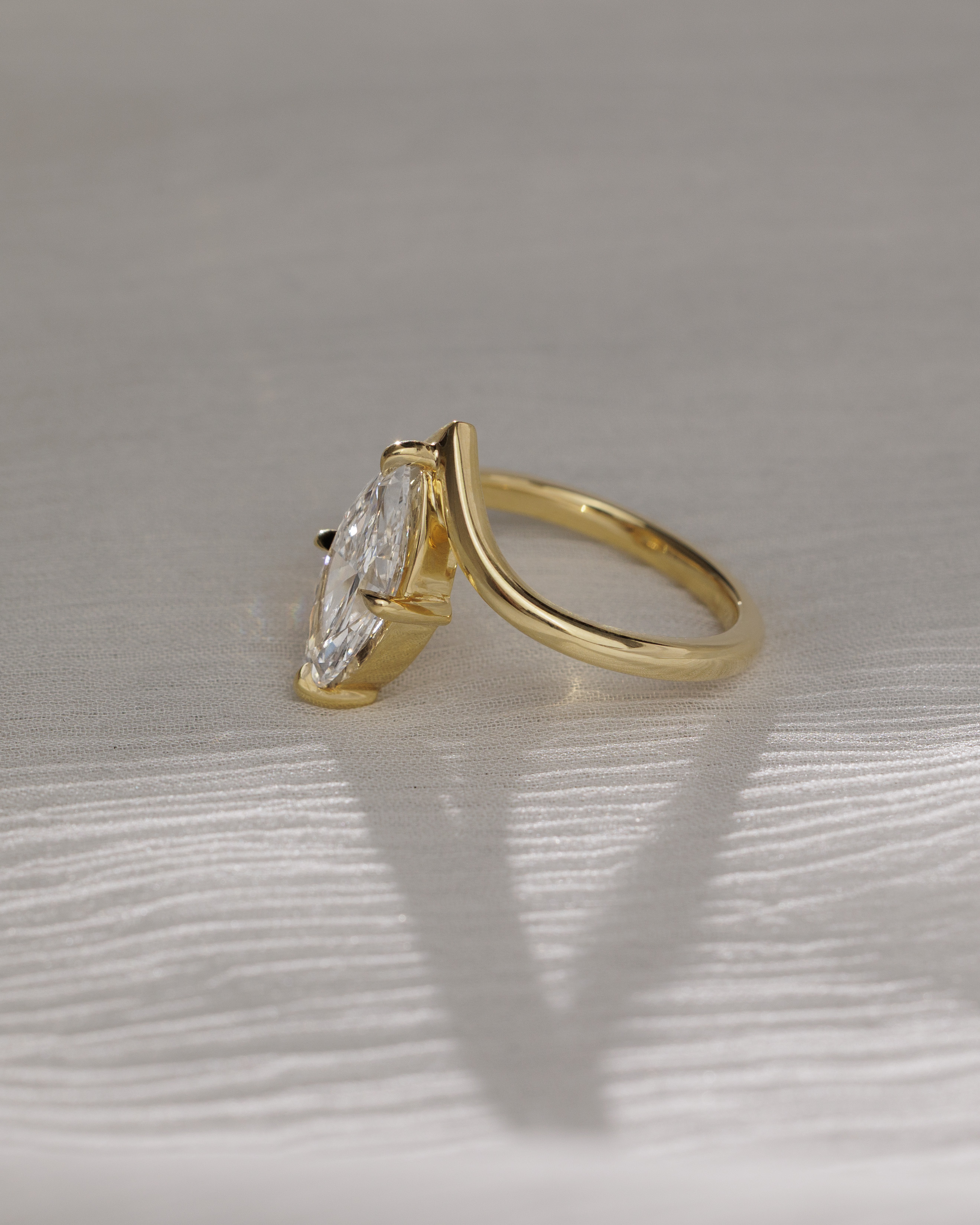 Giselle - Marquise Solitaire with Deep V Band Lifestyle Image