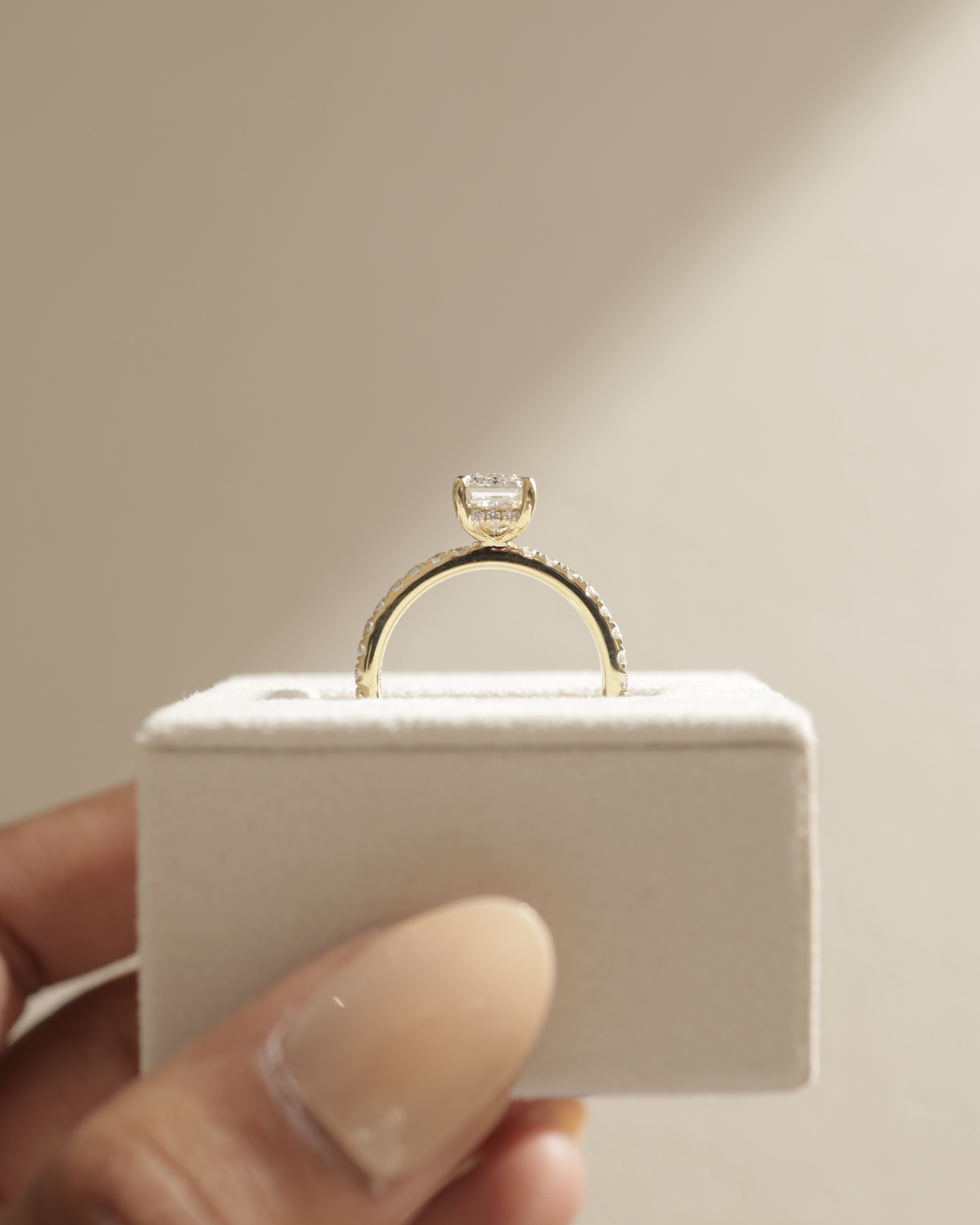 Gwyneth - Emerald Solitaire with Hidden Halo Lifestyle Image