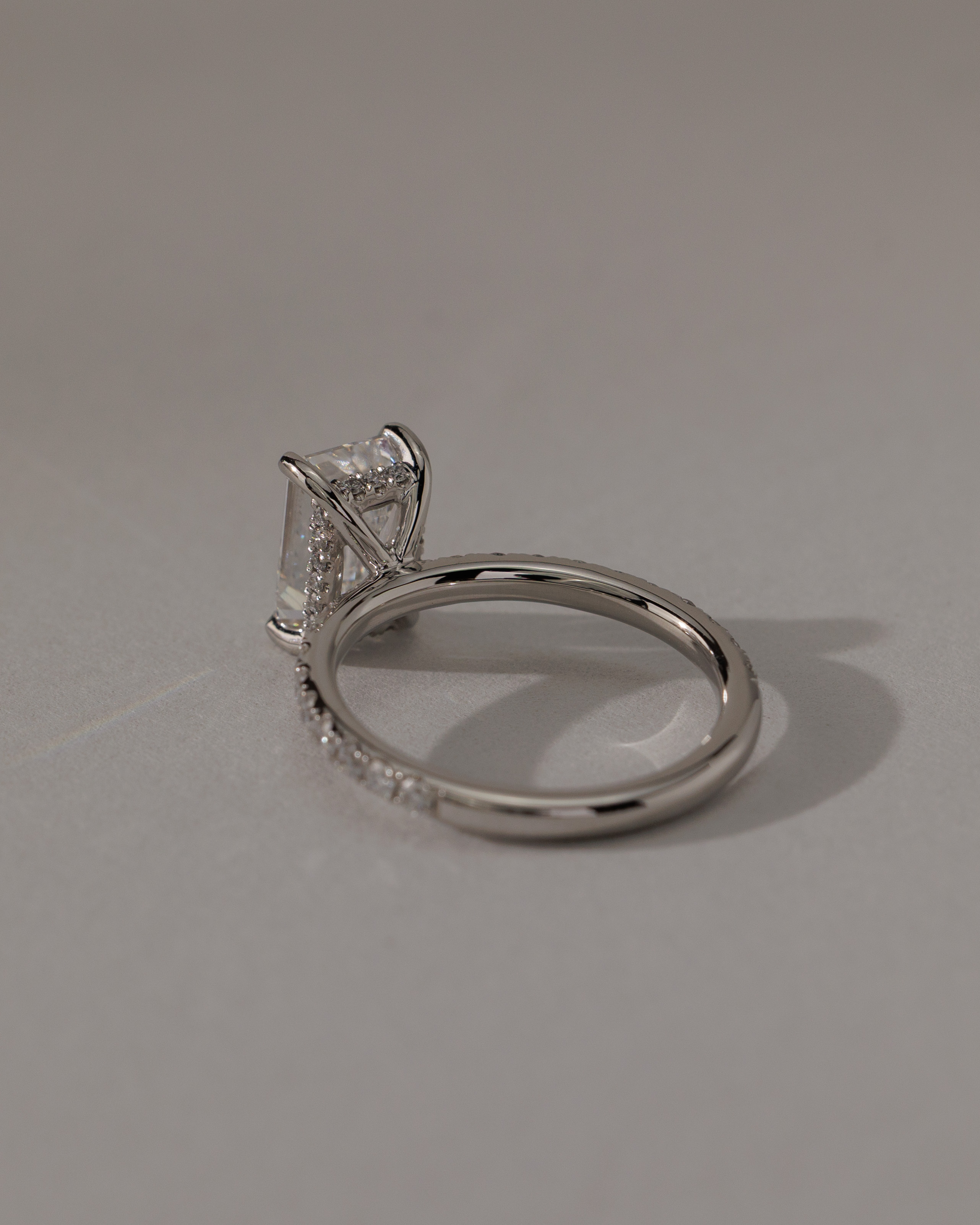 Gwyneth - Emerald Solitaire with Hidden Halo Lifestyle Image