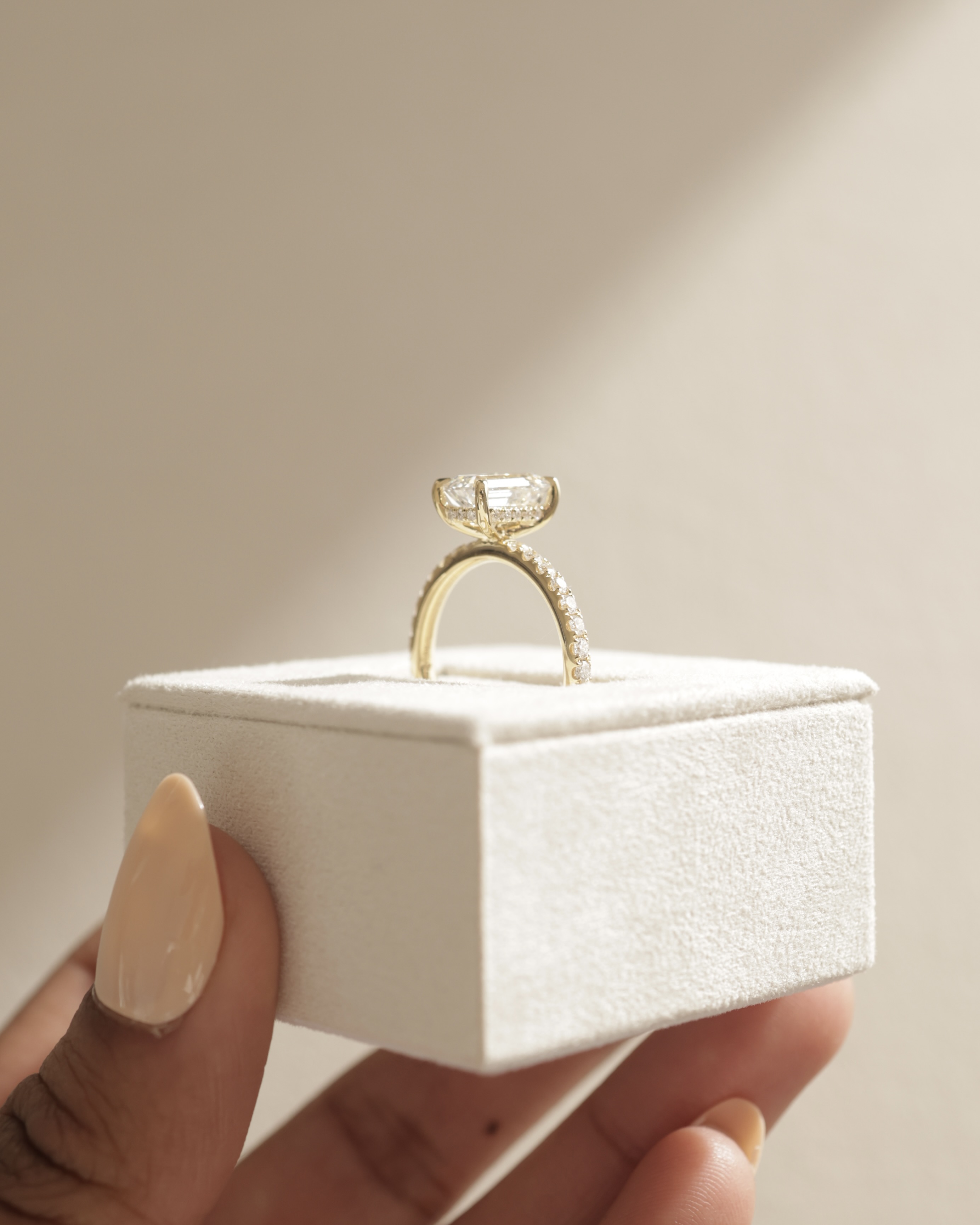 Gwyneth - Emerald Solitaire with Hidden Halo Lifestyle Image