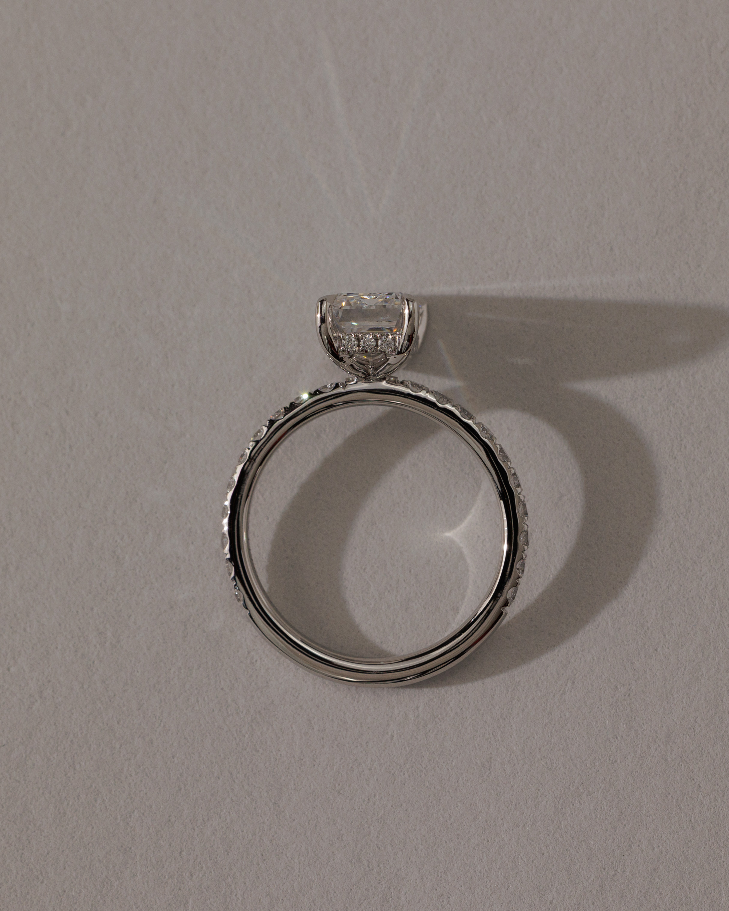 Gwyneth - Emerald Solitaire with Hidden Halo Lifestyle Image