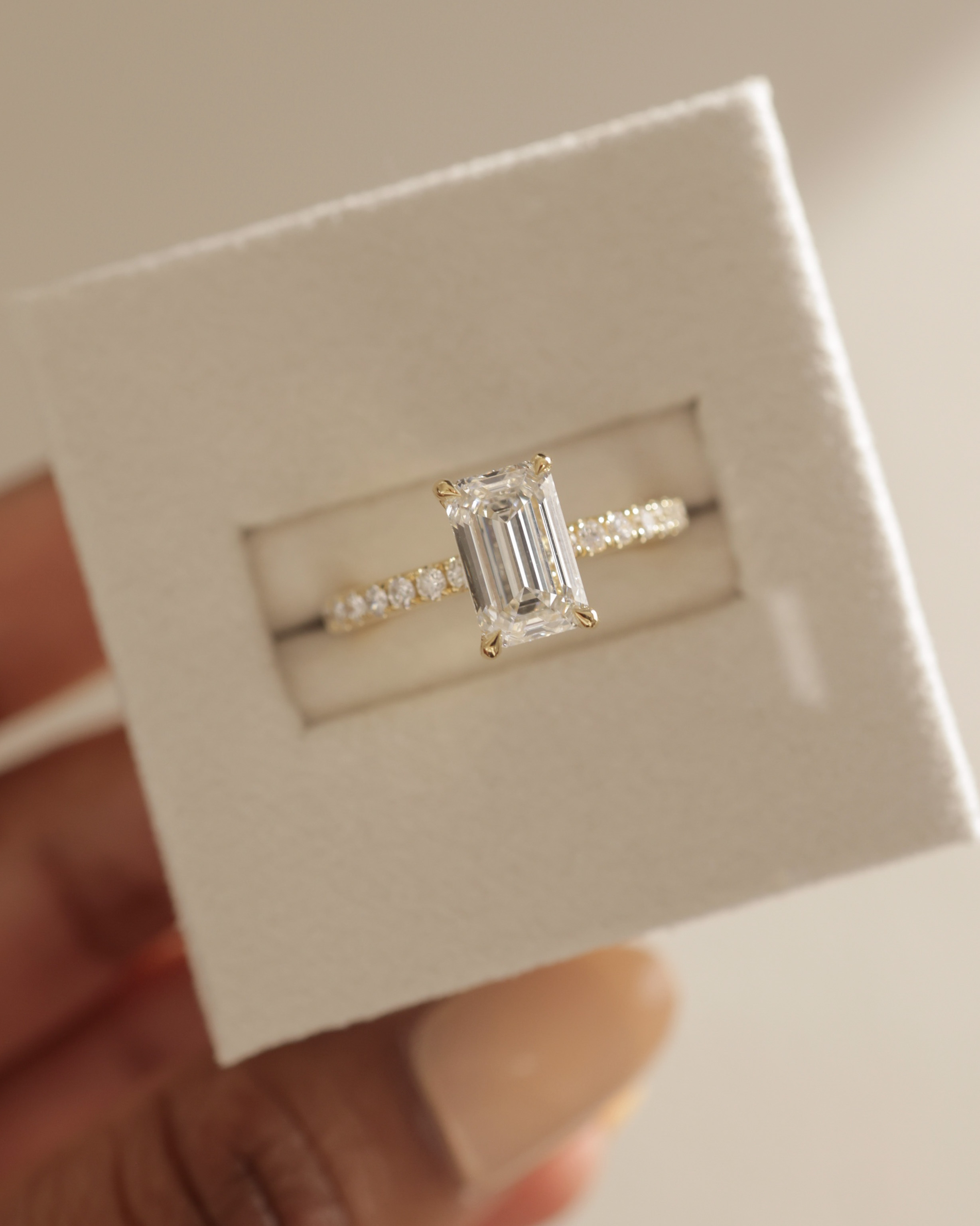 Gwyneth - Emerald Solitaire with Hidden Halo Lifestyle Image