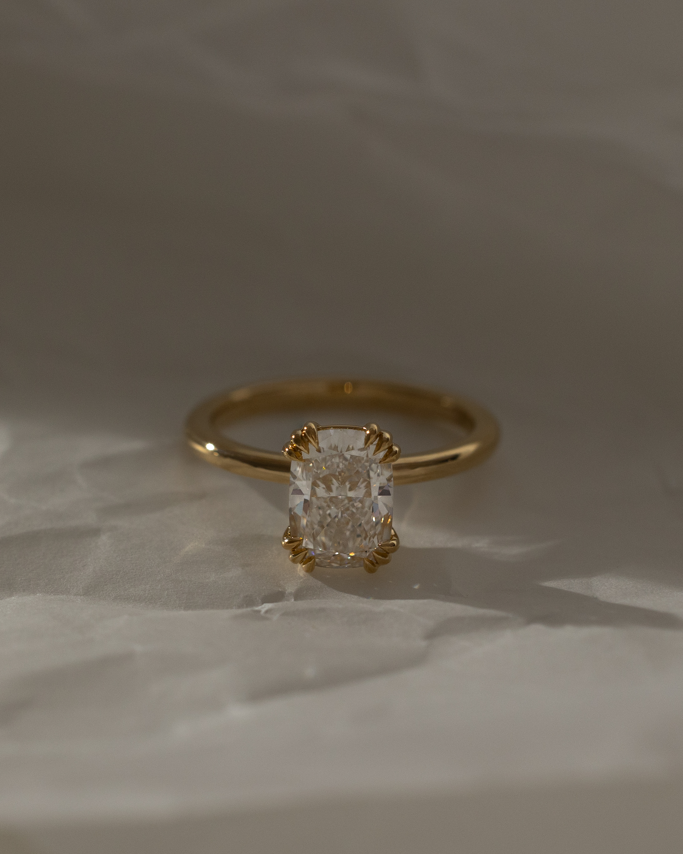 Helena  Elongated Cushion Solitaire with Triple-Split Claws Lifestyle Image