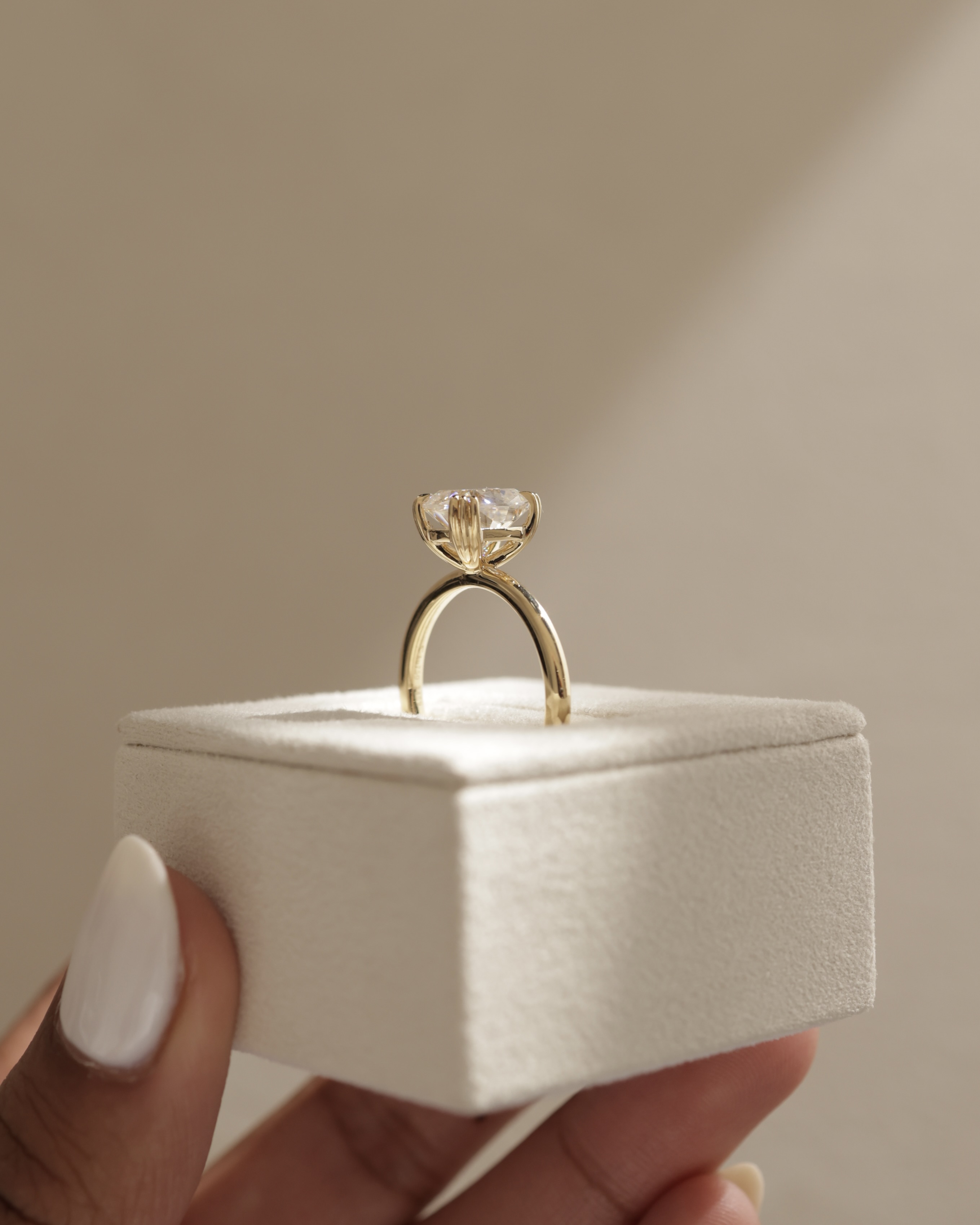 Helena  Elongated Cushion Solitaire with Triple-Split Claws Lifestyle Image