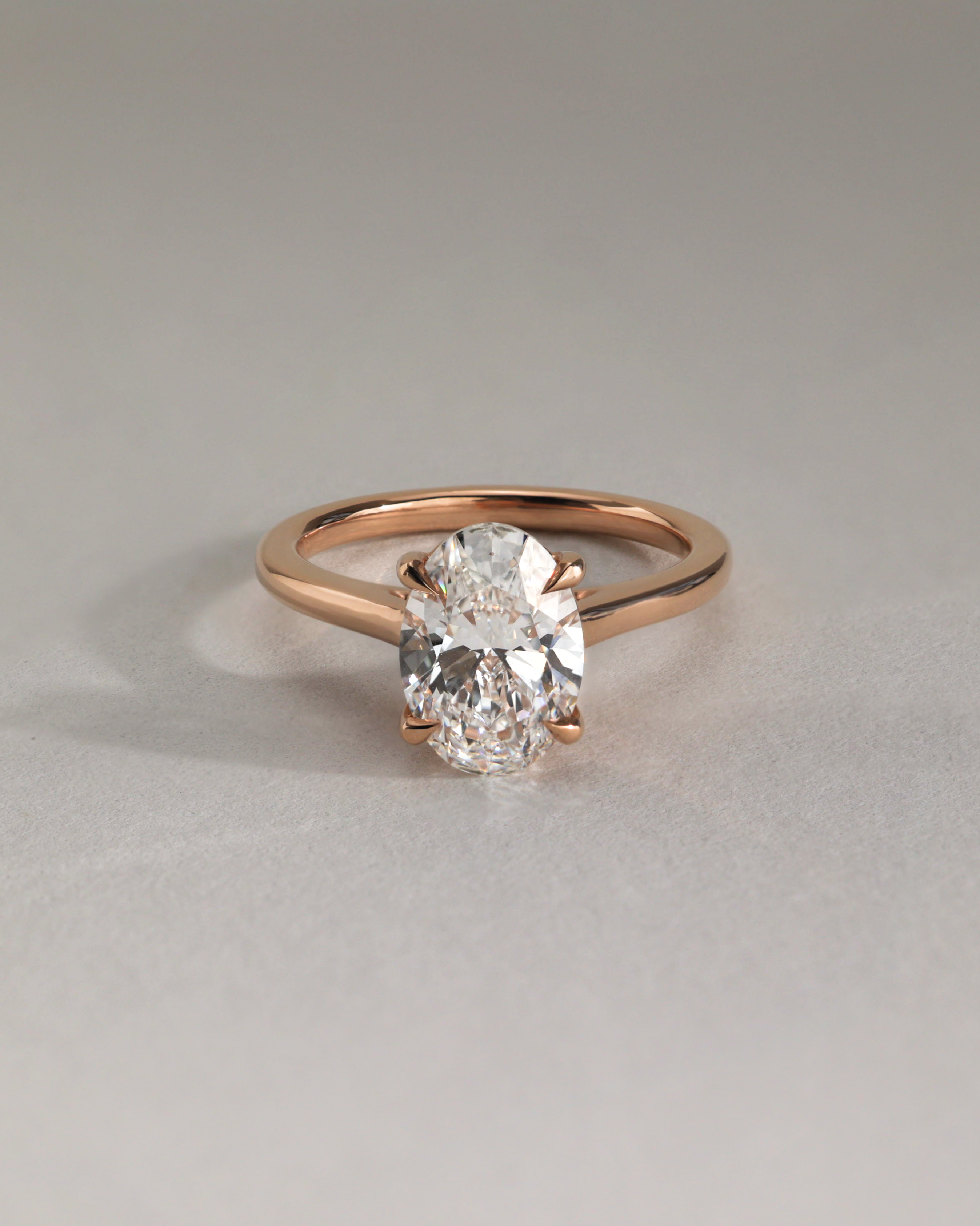 Hilary - 4 Claw Oval Solitaire Lifestyle Image