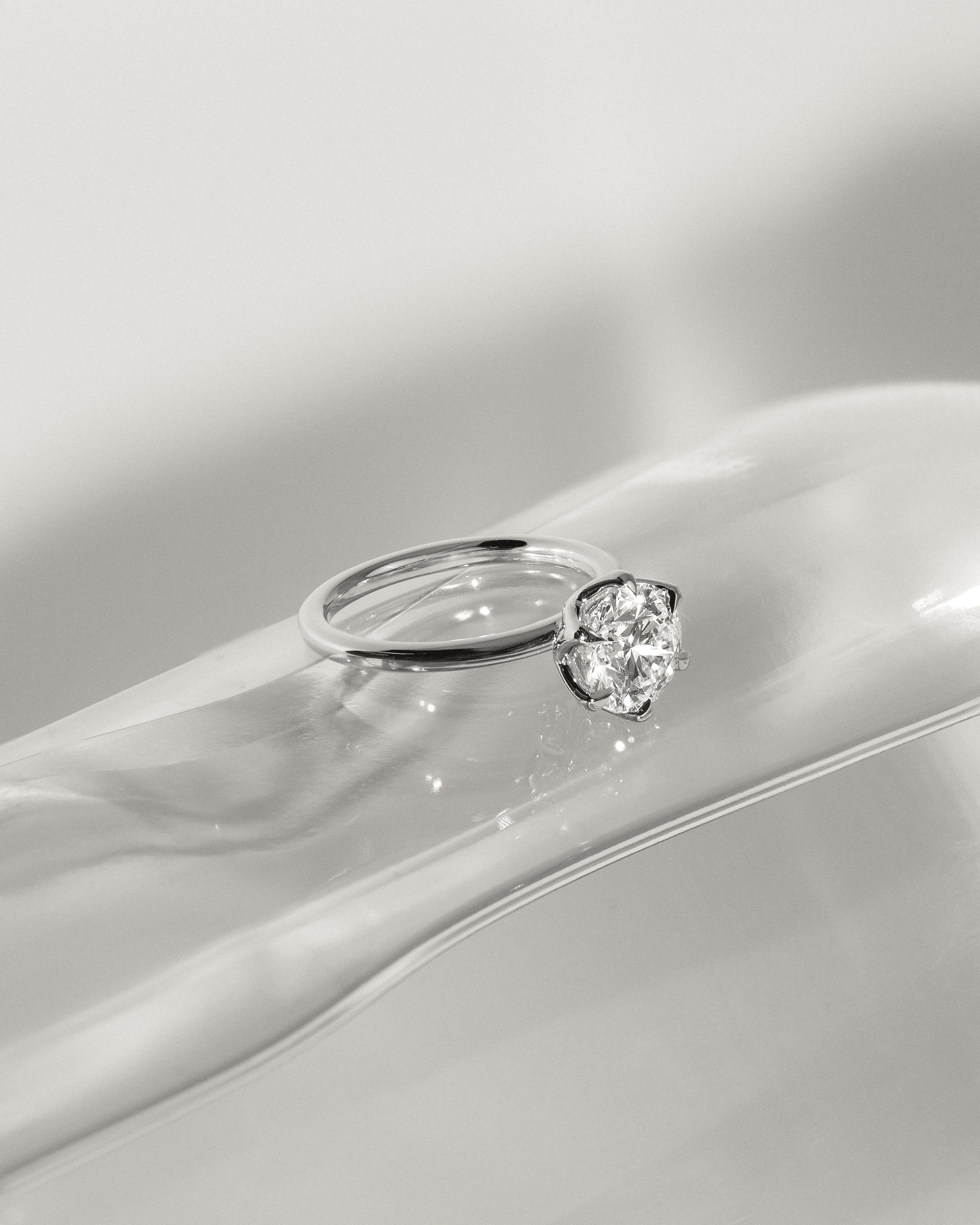 Iris  6 Claw Round Solitaire Lifestyle Image