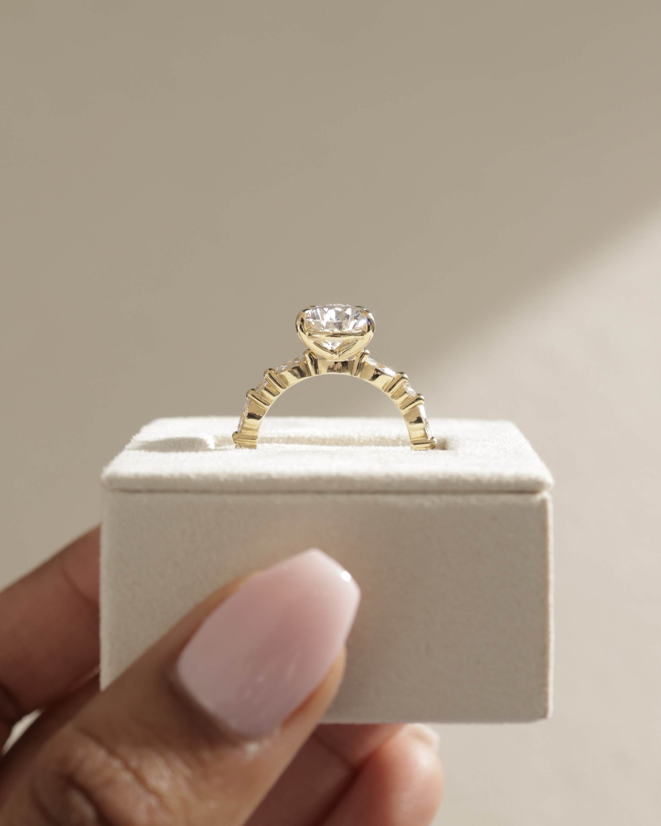Jacinta - Pear Solitaire with Accent Band Lifestyle Image
