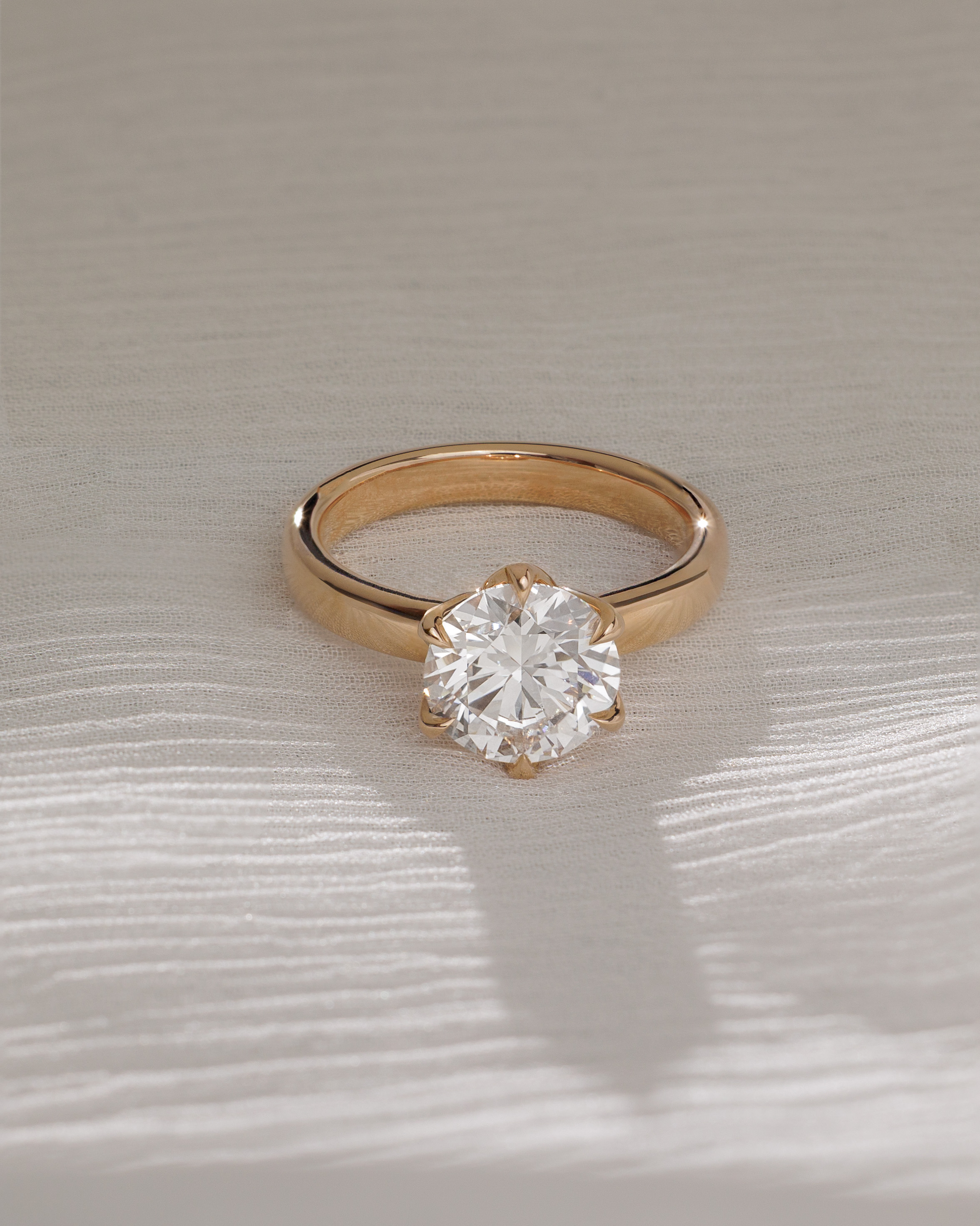 Jayden - 6 Claw Round Solitaire with Cigar Band Lifestyle Image