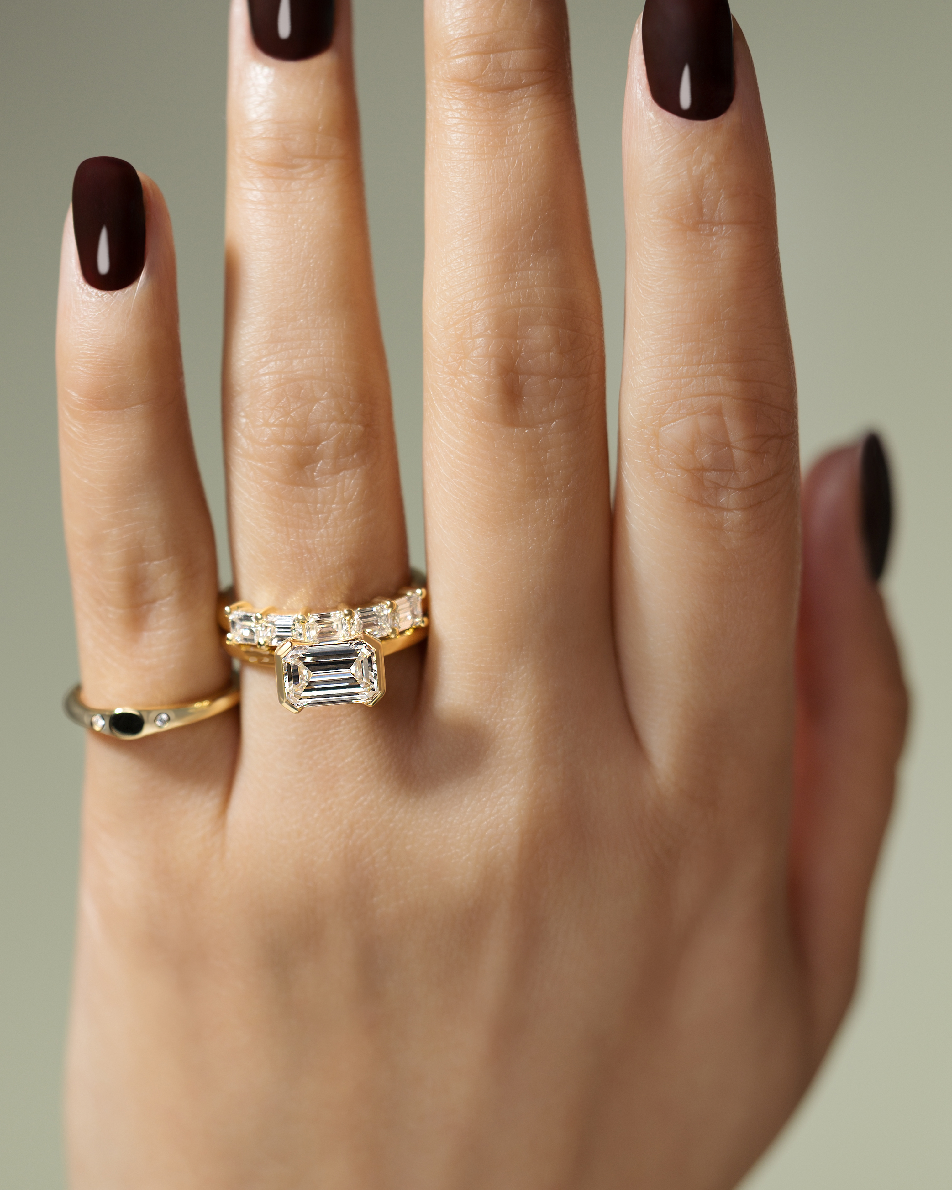 Jodie - Emerald Half Bezel Solitaire Lifestyle Image