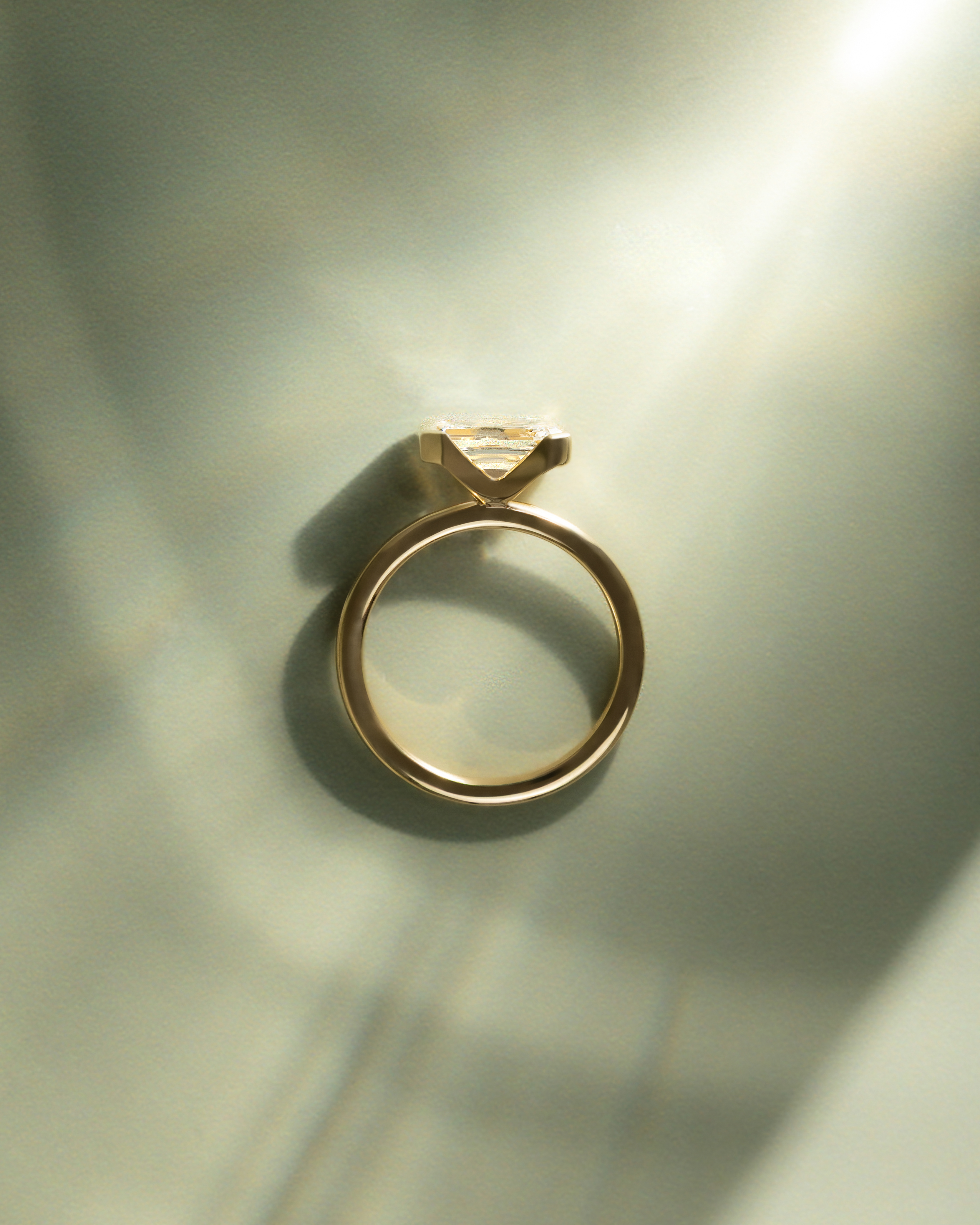 Jodie - Emerald Half Bezel Solitaire Lifestyle Image