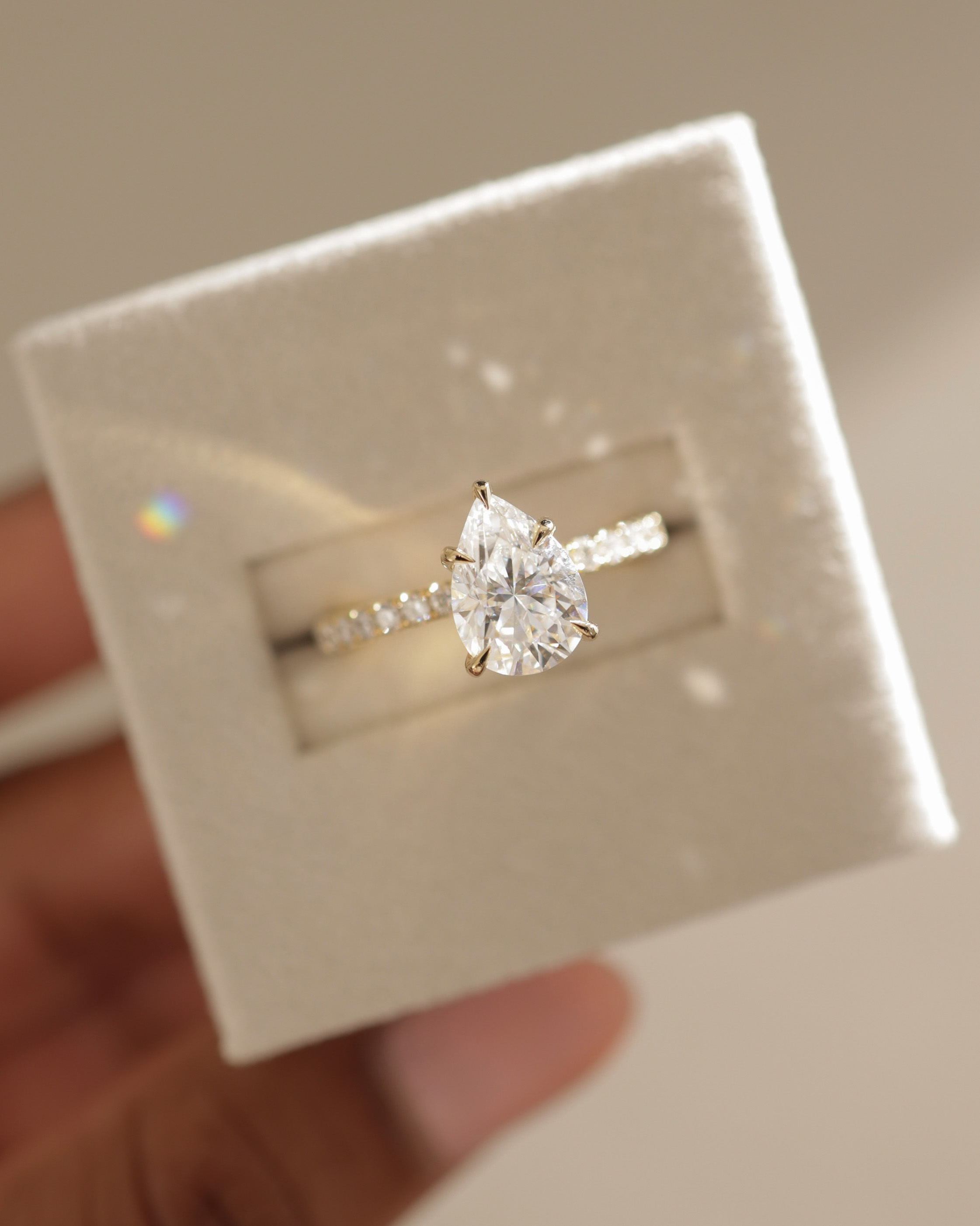 Jordanna  5 Claw Pear Pav Solitaire with Hidden Halo Lifestyle Image