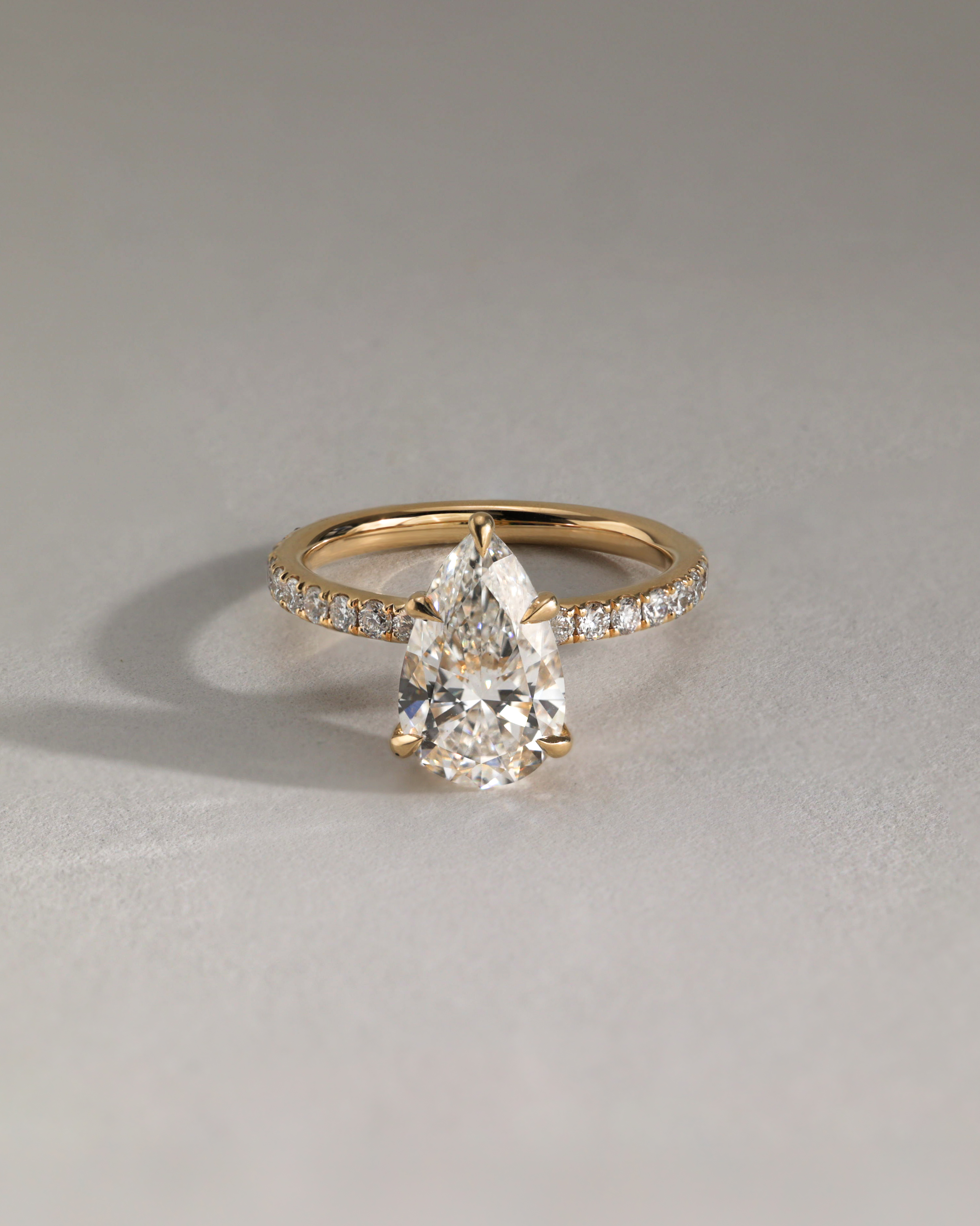 Jordanna  5 Claw Pear Pav Solitaire with Hidden Halo Lifestyle Image