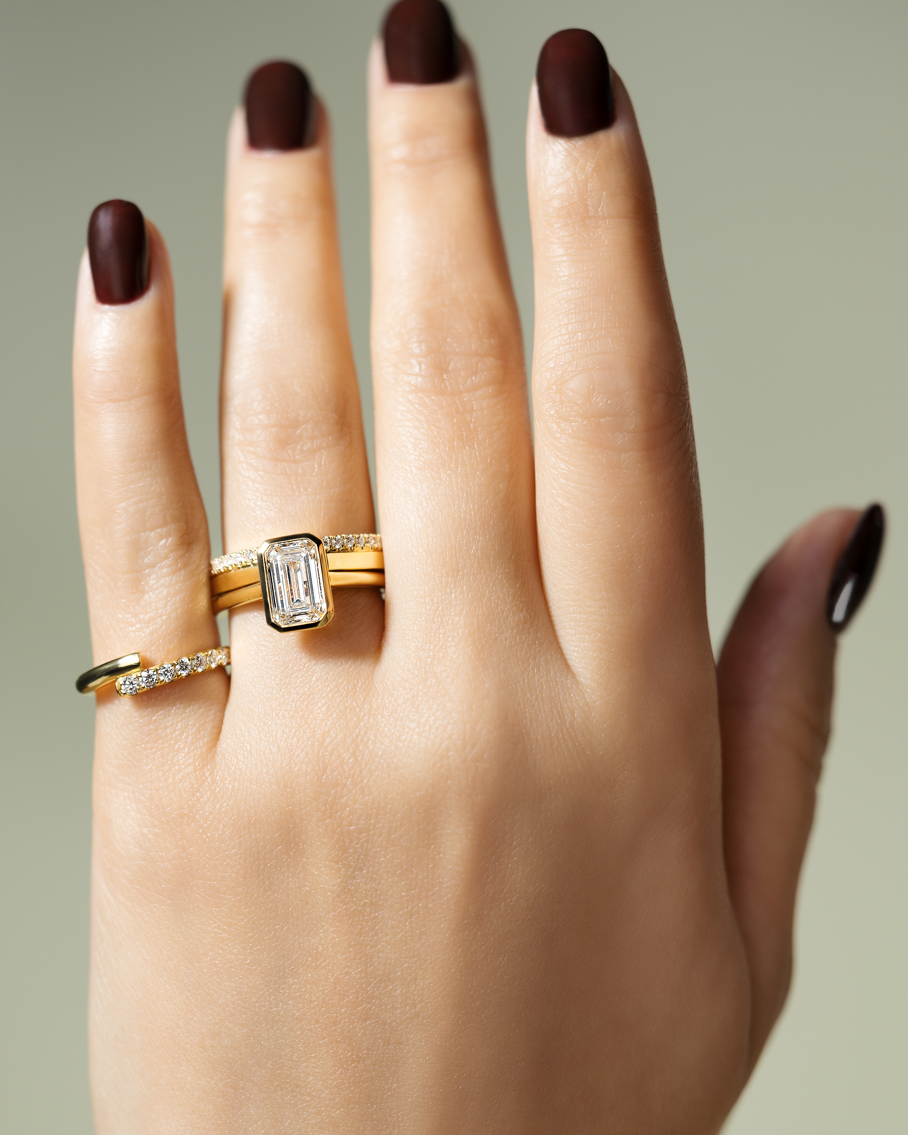 Journee - Bezel Set Emerald Solitaire Lifestyle Image