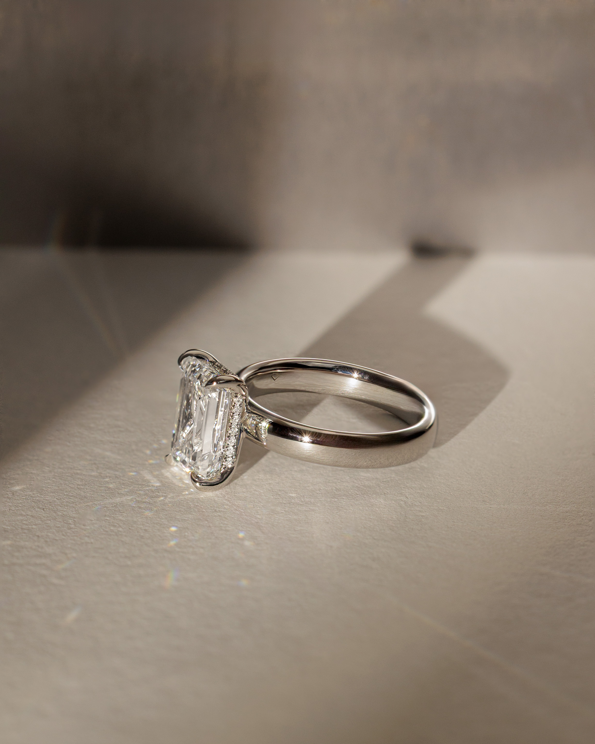 Kate - Emerald Solitaire with Cigar Band Lifestyle Image