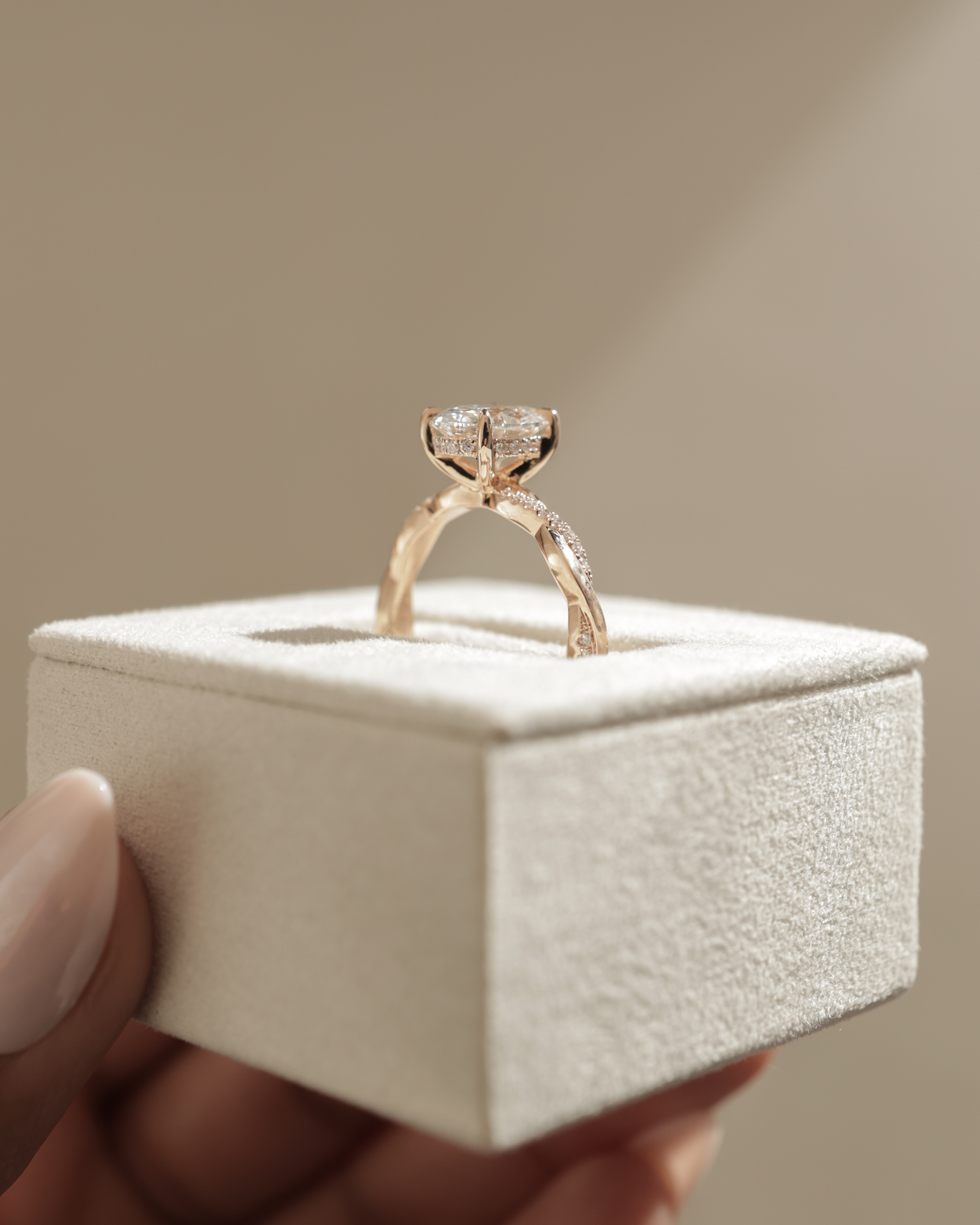 Lara - Oval Solitaire with Twisted Pav Band Lifestyle Image