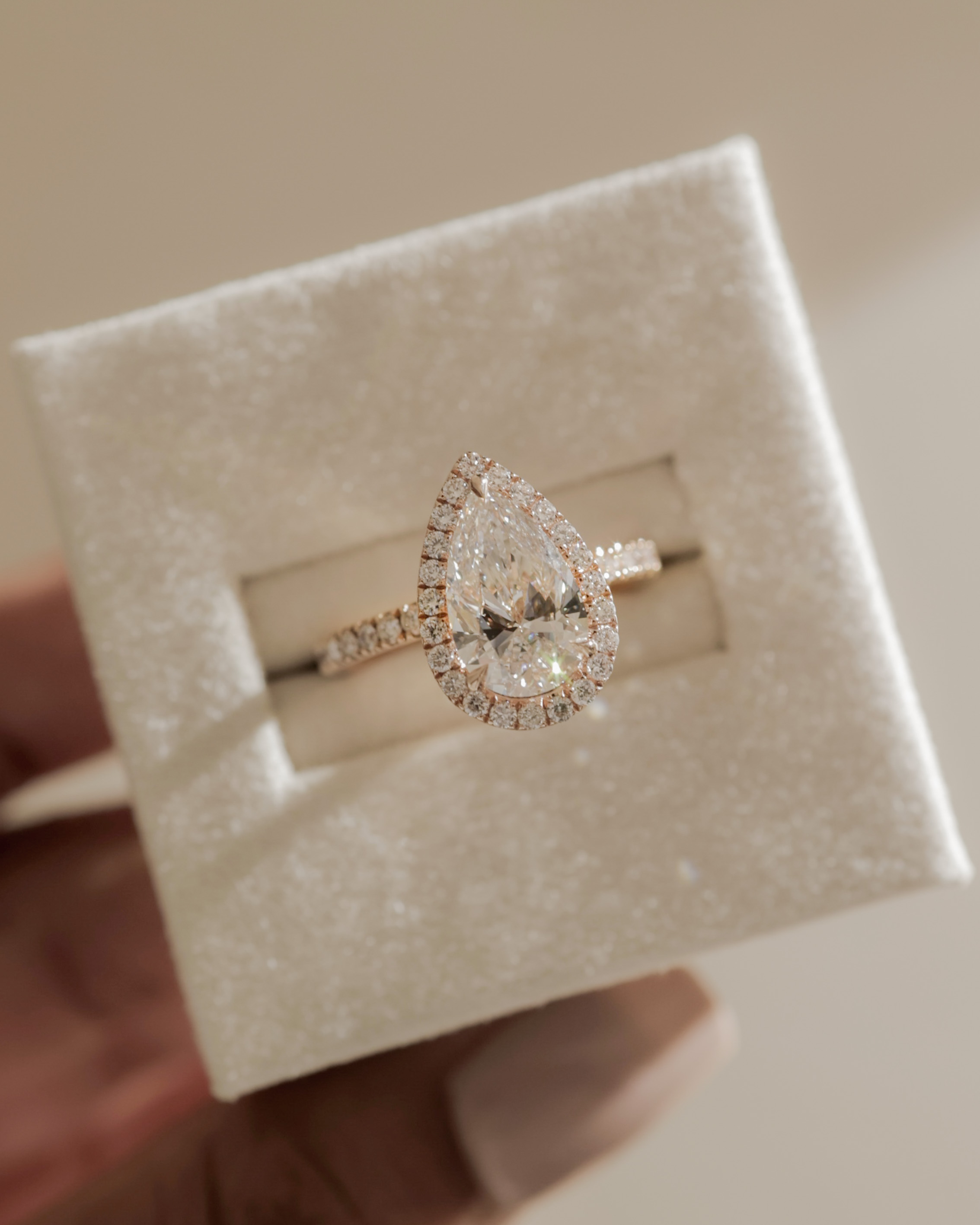 Lauren - Pear Halo with Pav Set Lifestyle Image