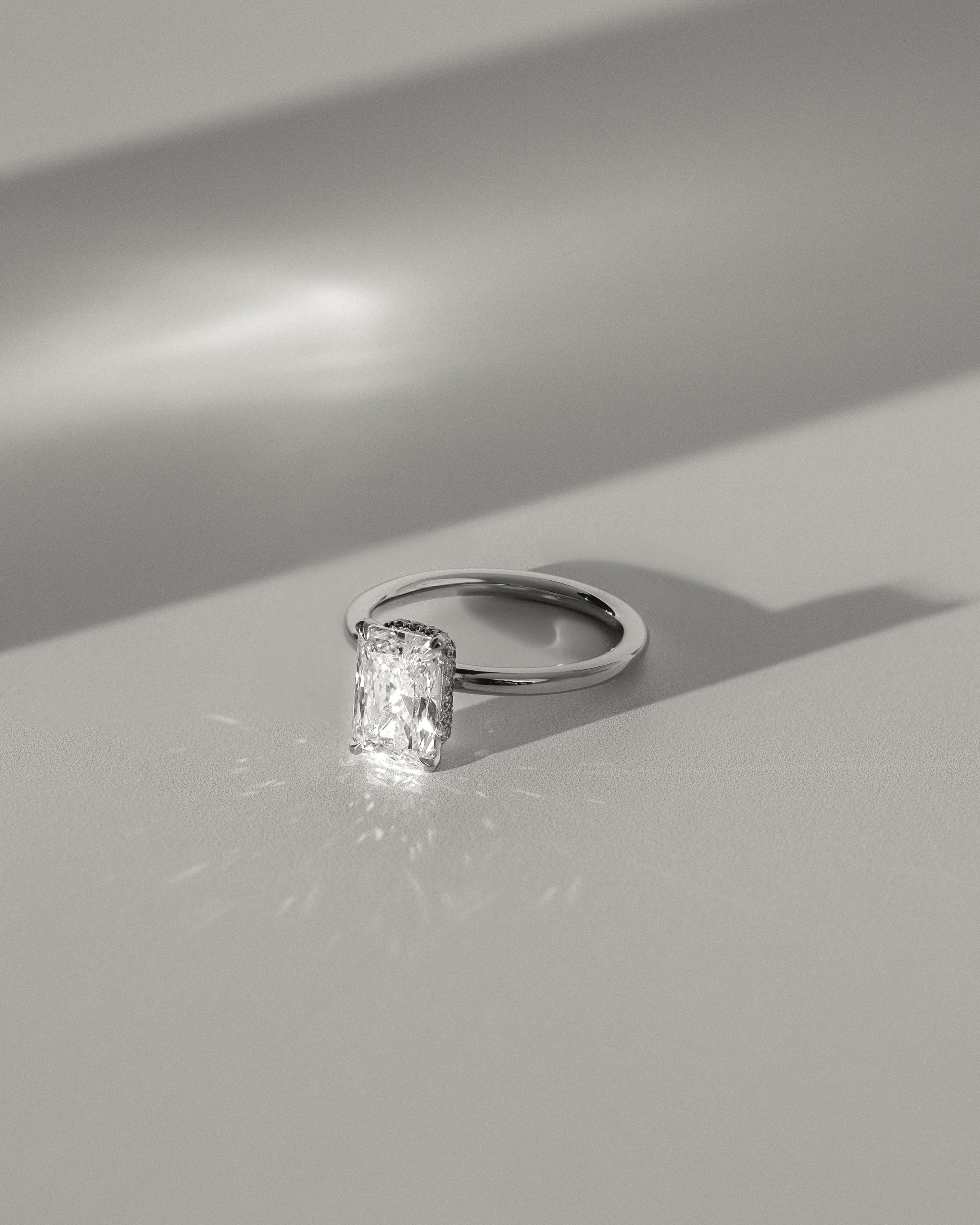 Liberty - Radiant Solitaire with Wrap Around Hidden Halo Lifestyle Image