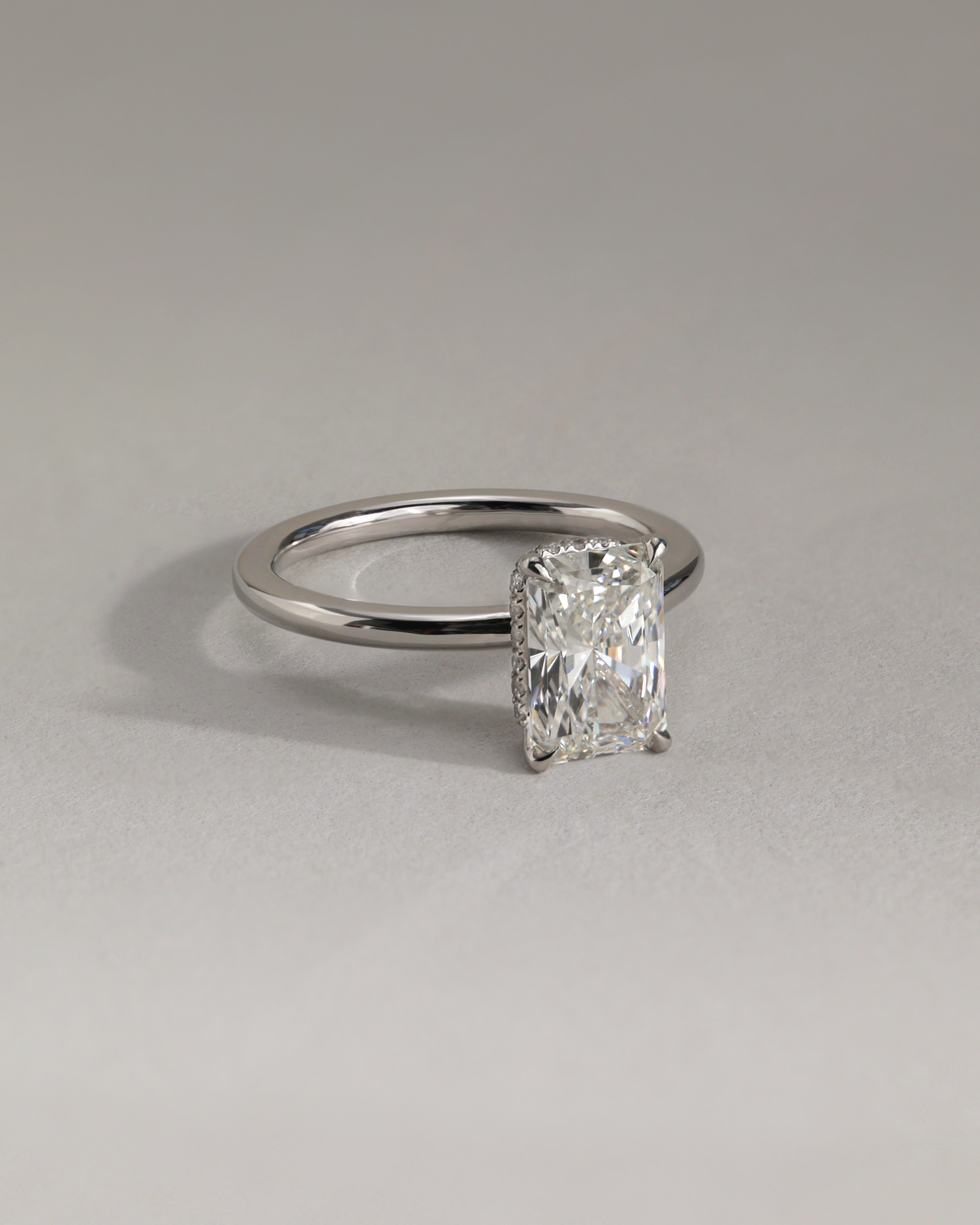 Liberty - Radiant Solitaire with Wrap Around Hidden Halo Lifestyle Image