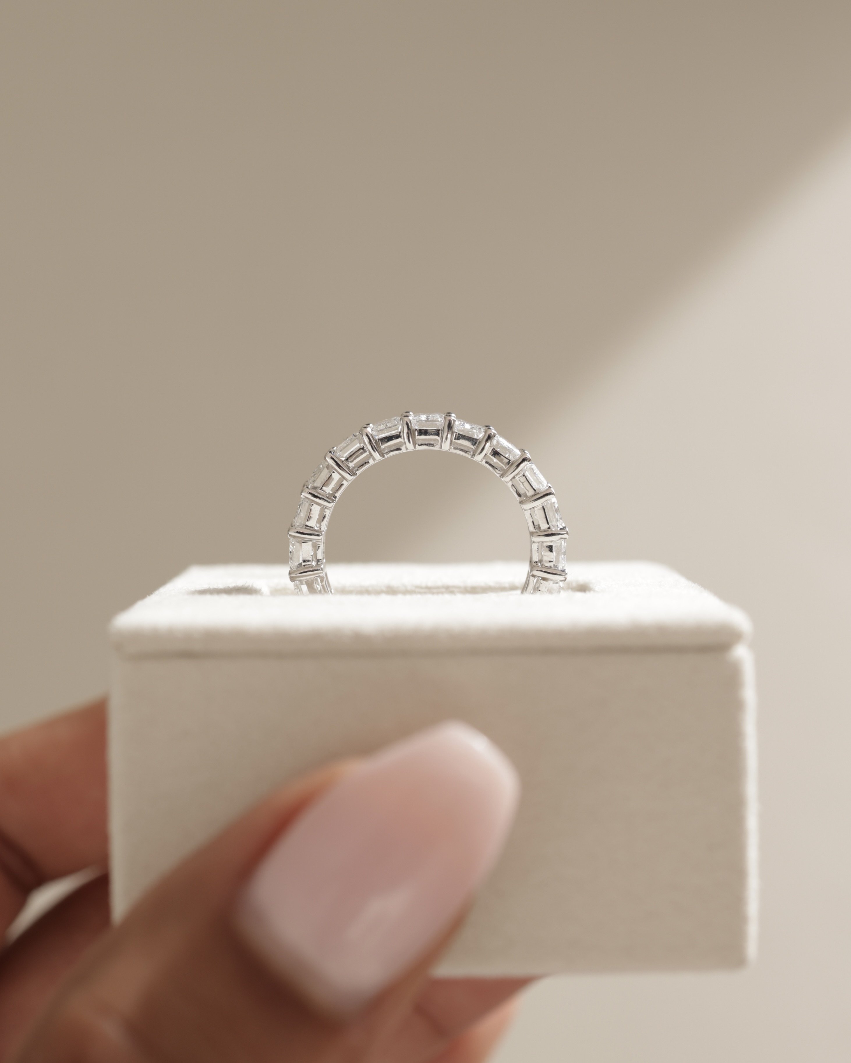 London - Emerald Basket Set Eternity Ring Lifestyle Image