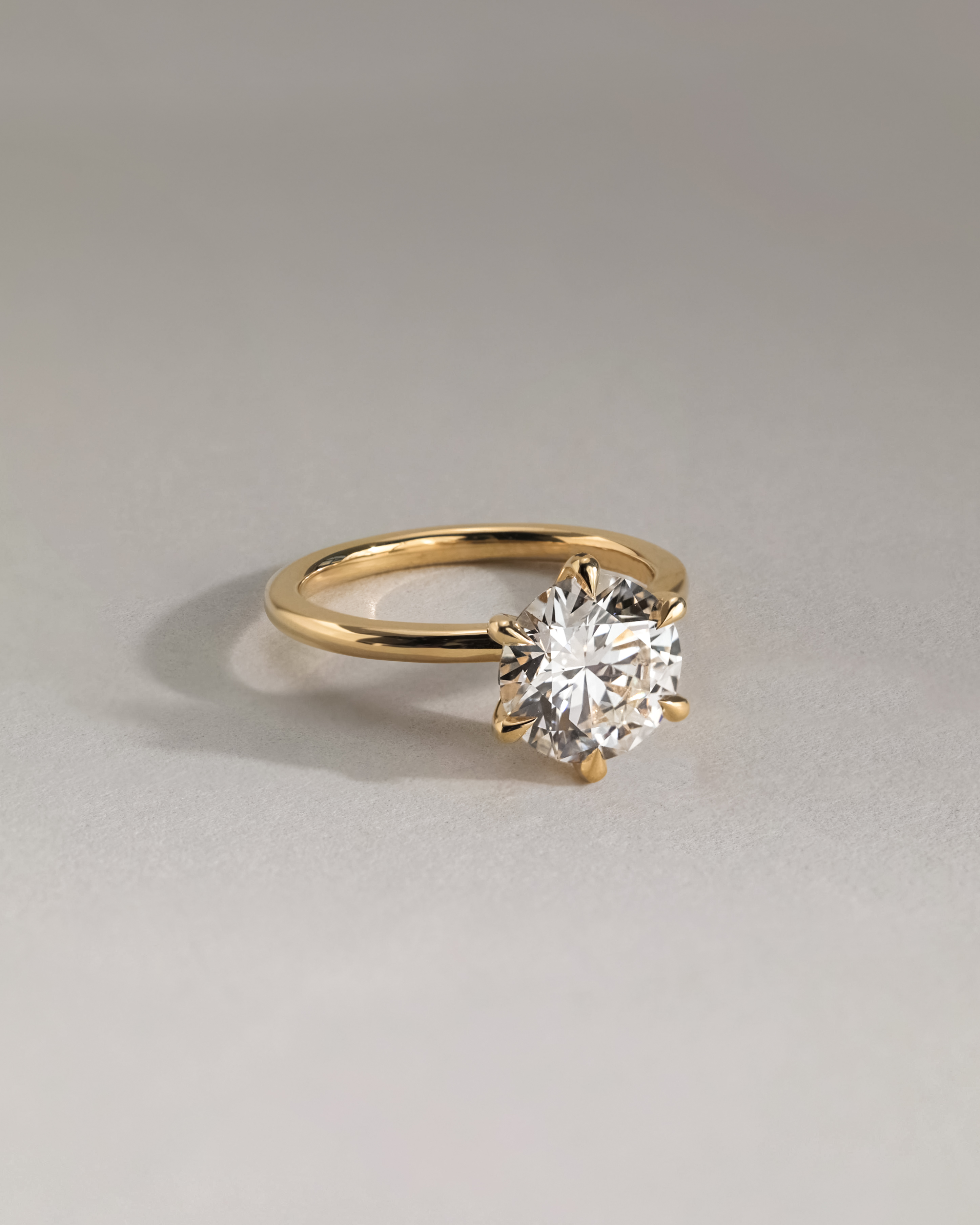 Louise  6 Claw Round Solitaire Lifestyle Image