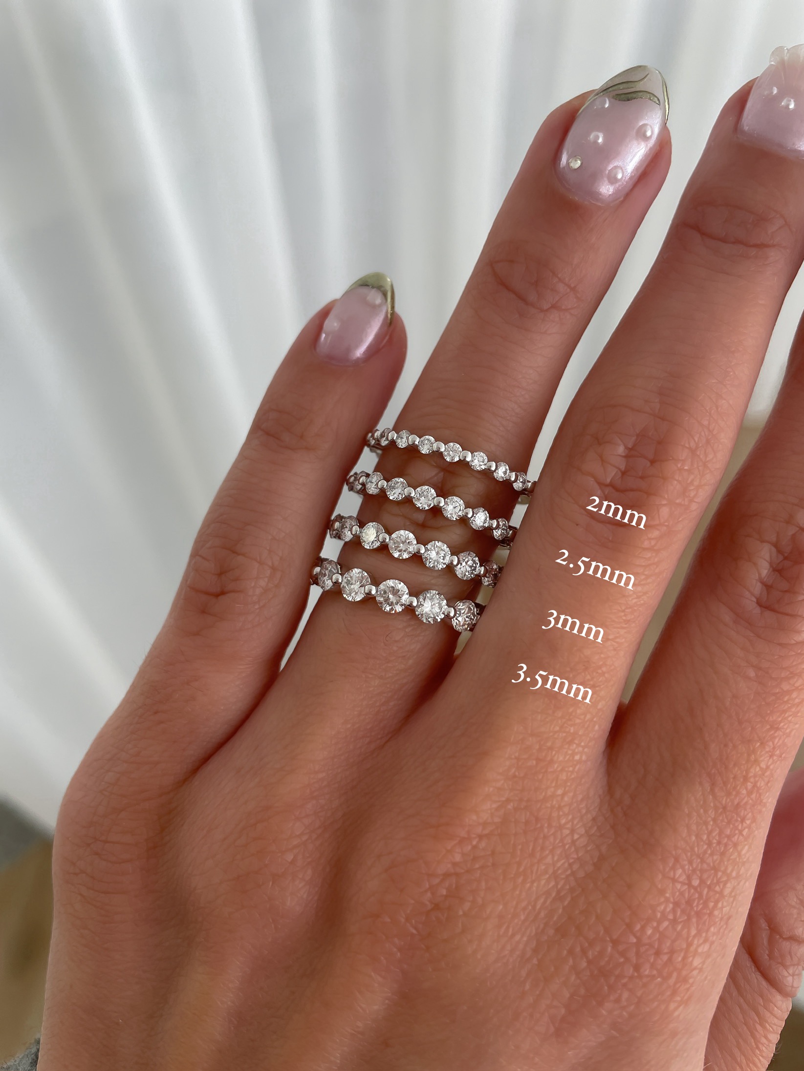 Lucy - Shared Prong Wedding Ring Lifestyle Image