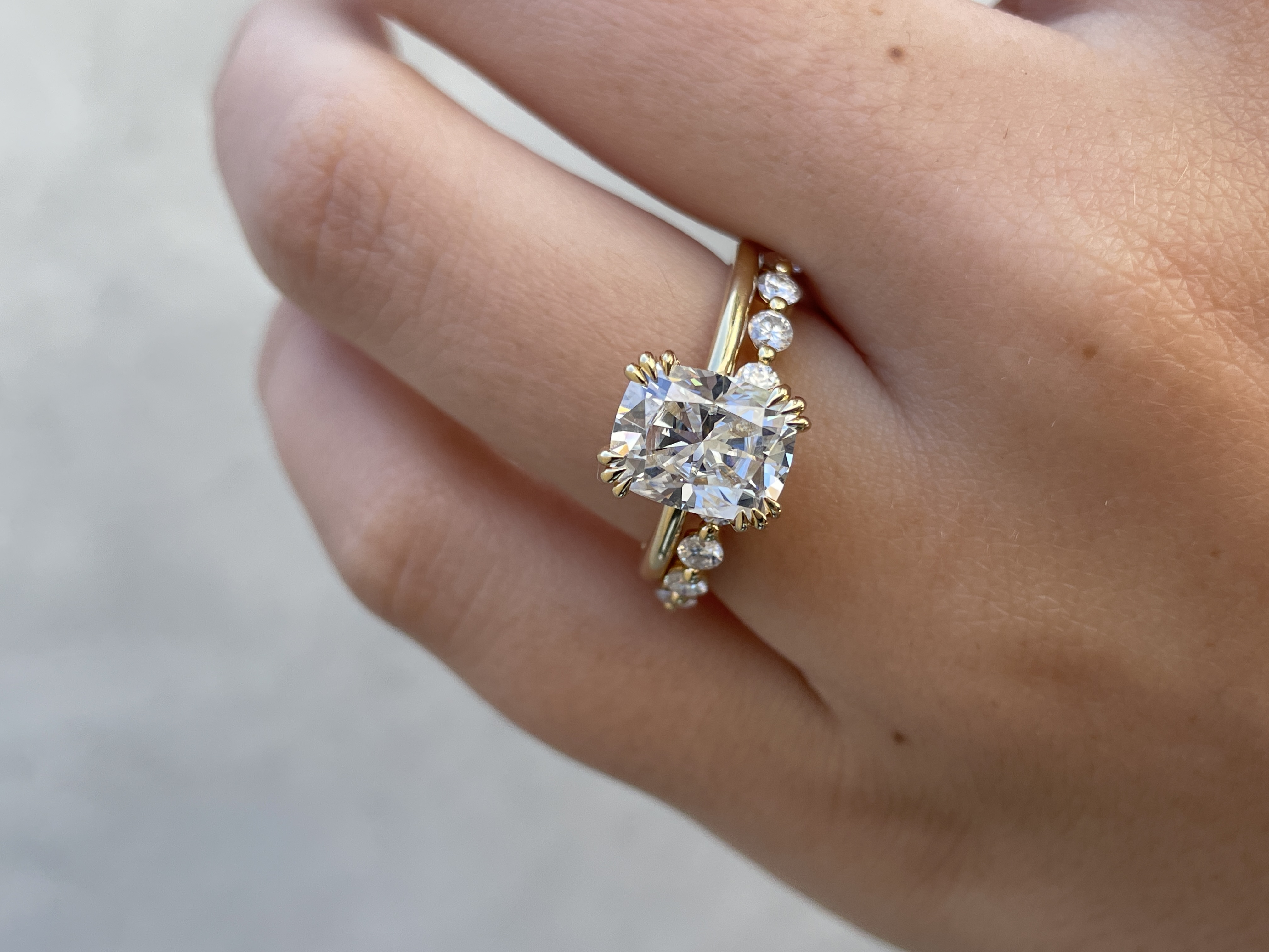 Lucy - Shared Prong Wedding Ring Lifestyle Image