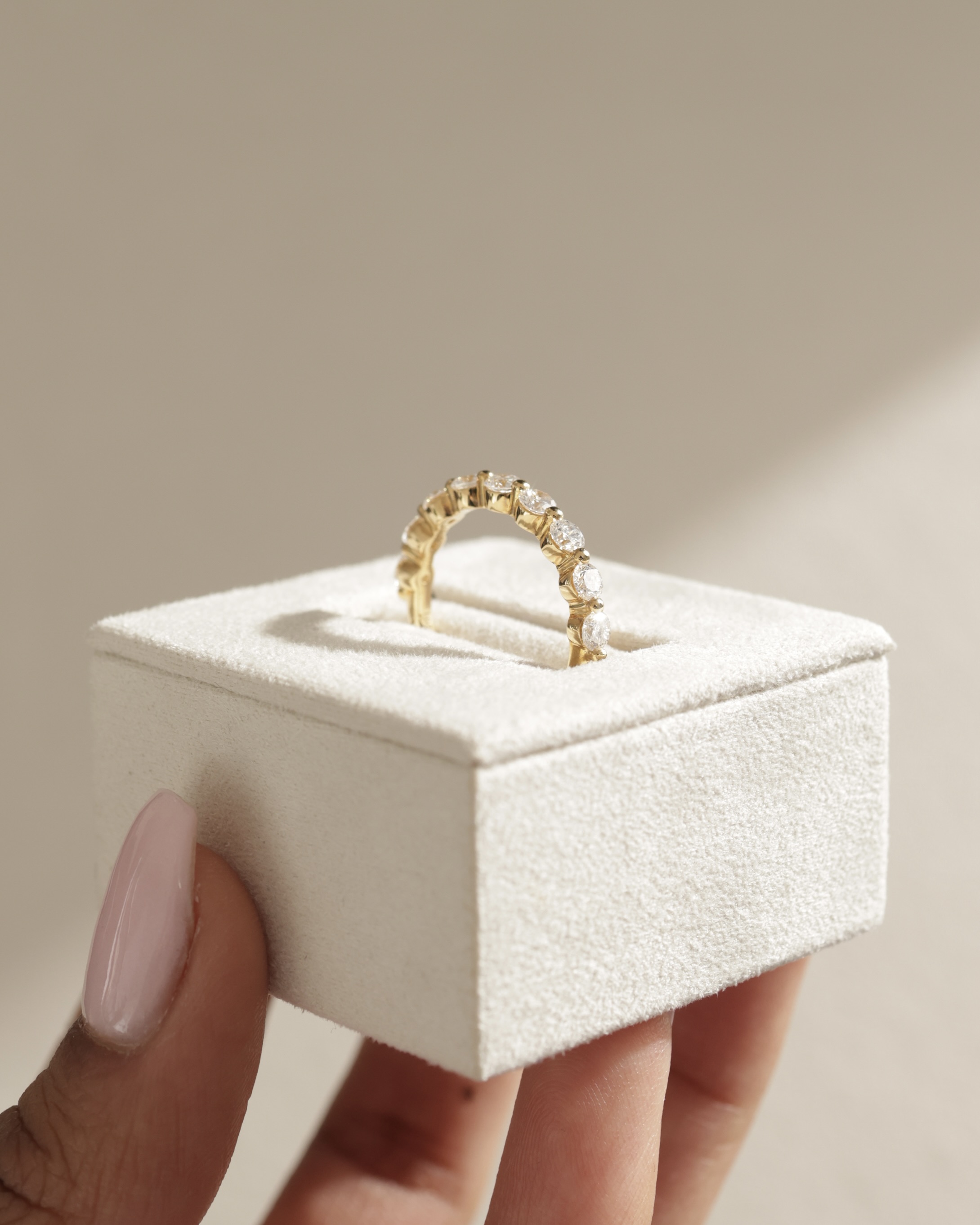 Lucy - Shared Prong Wedding Ring Lifestyle Image