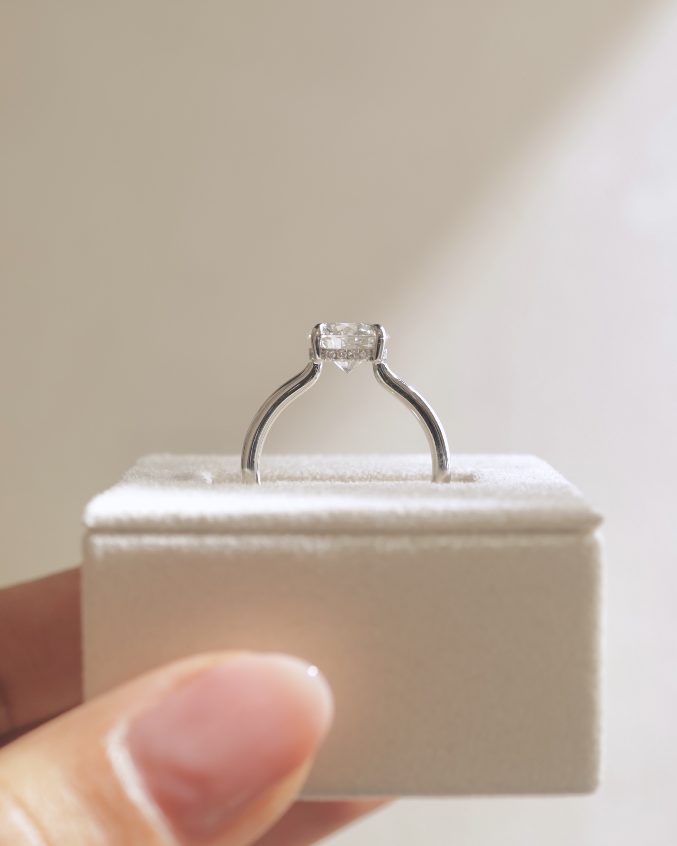 Luna - Round Floating Low Set Flush Solitaire with Hidden Halo Lifestyle Image