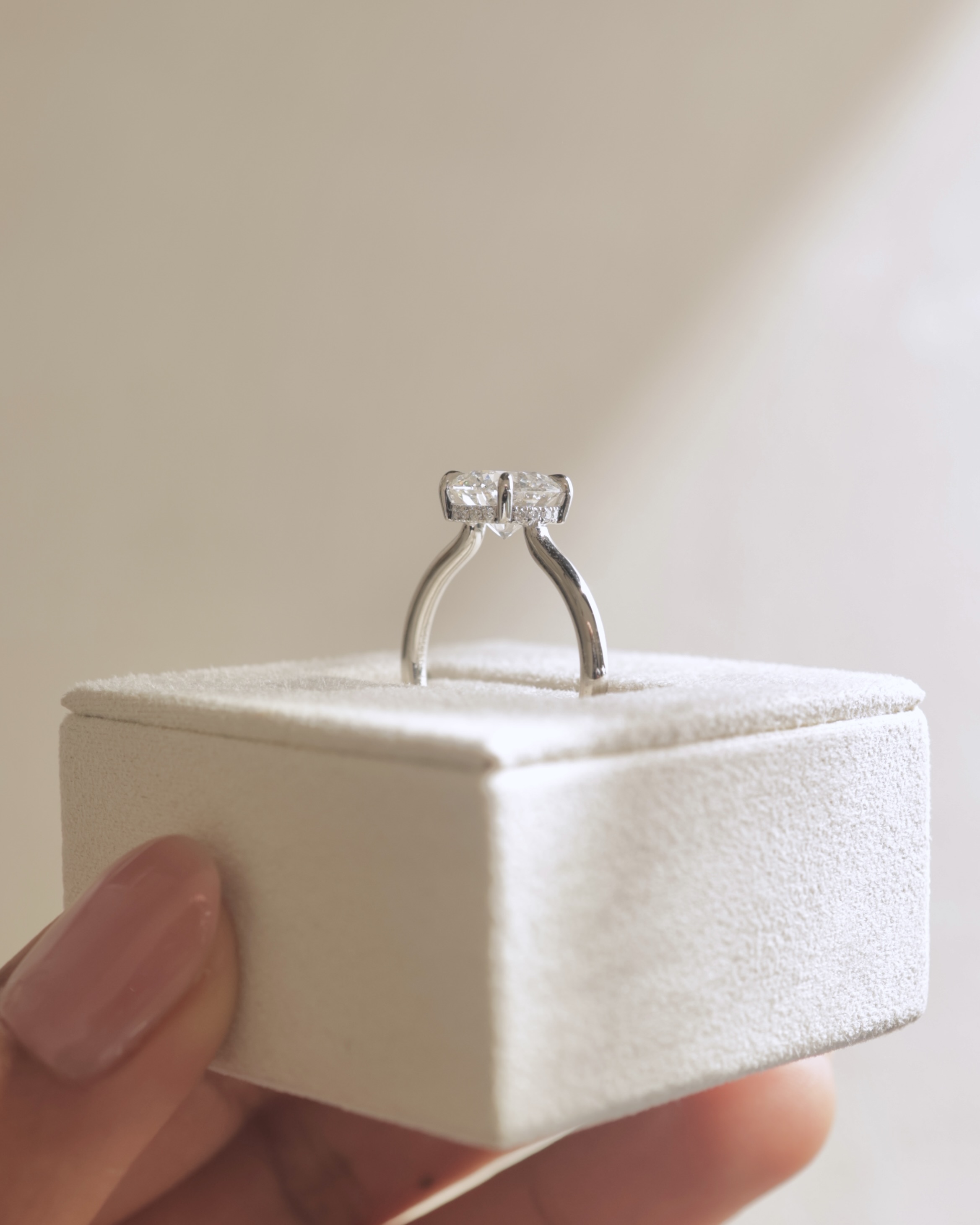 Luna - Round Floating Low Set Flush Solitaire with Hidden Halo Lifestyle Image