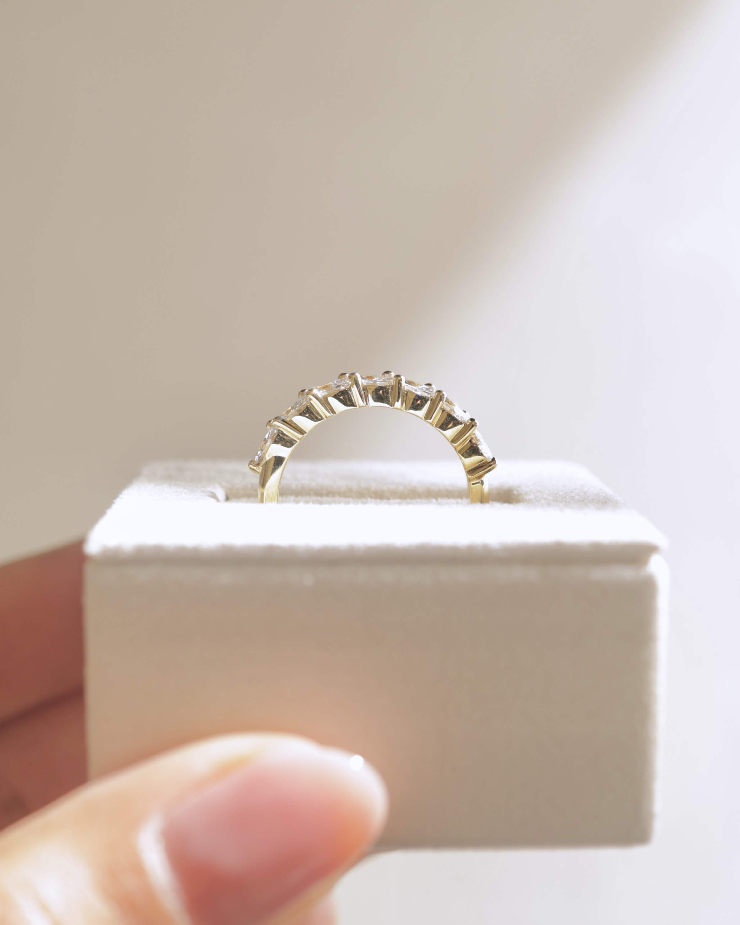 Lydia - 7 Stone Tilted Marquise Wedding Band Lifestyle Image