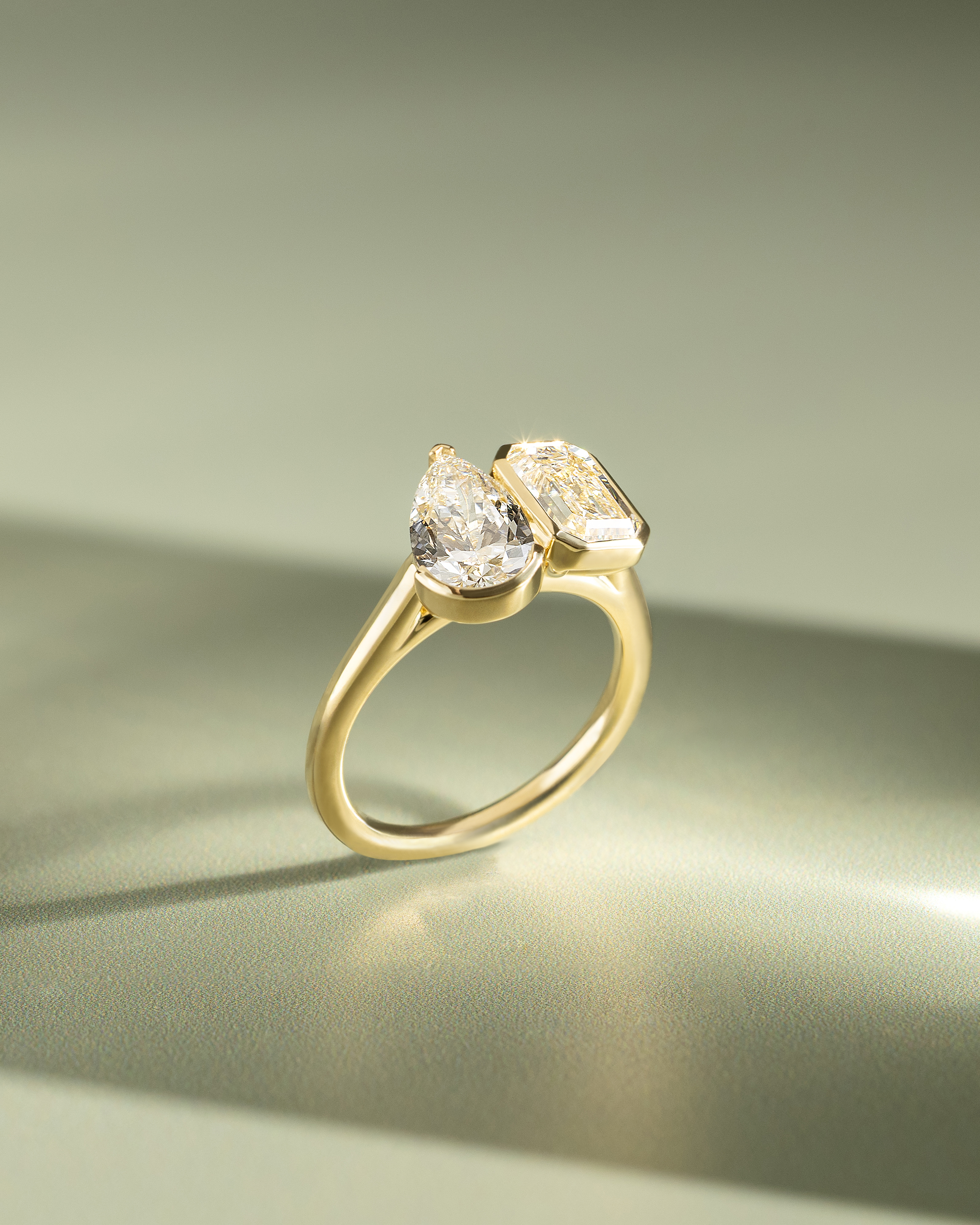 Margot - Bezel Set Pear and Emerald Toi Et Moi Lifestyle Image