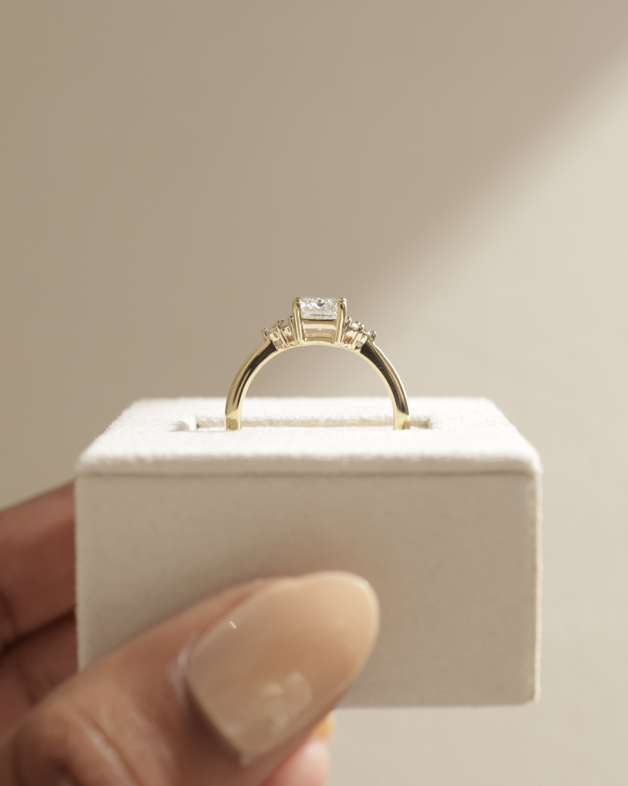 Martina - Emerald with Round Accent Stones Lifestyle Image