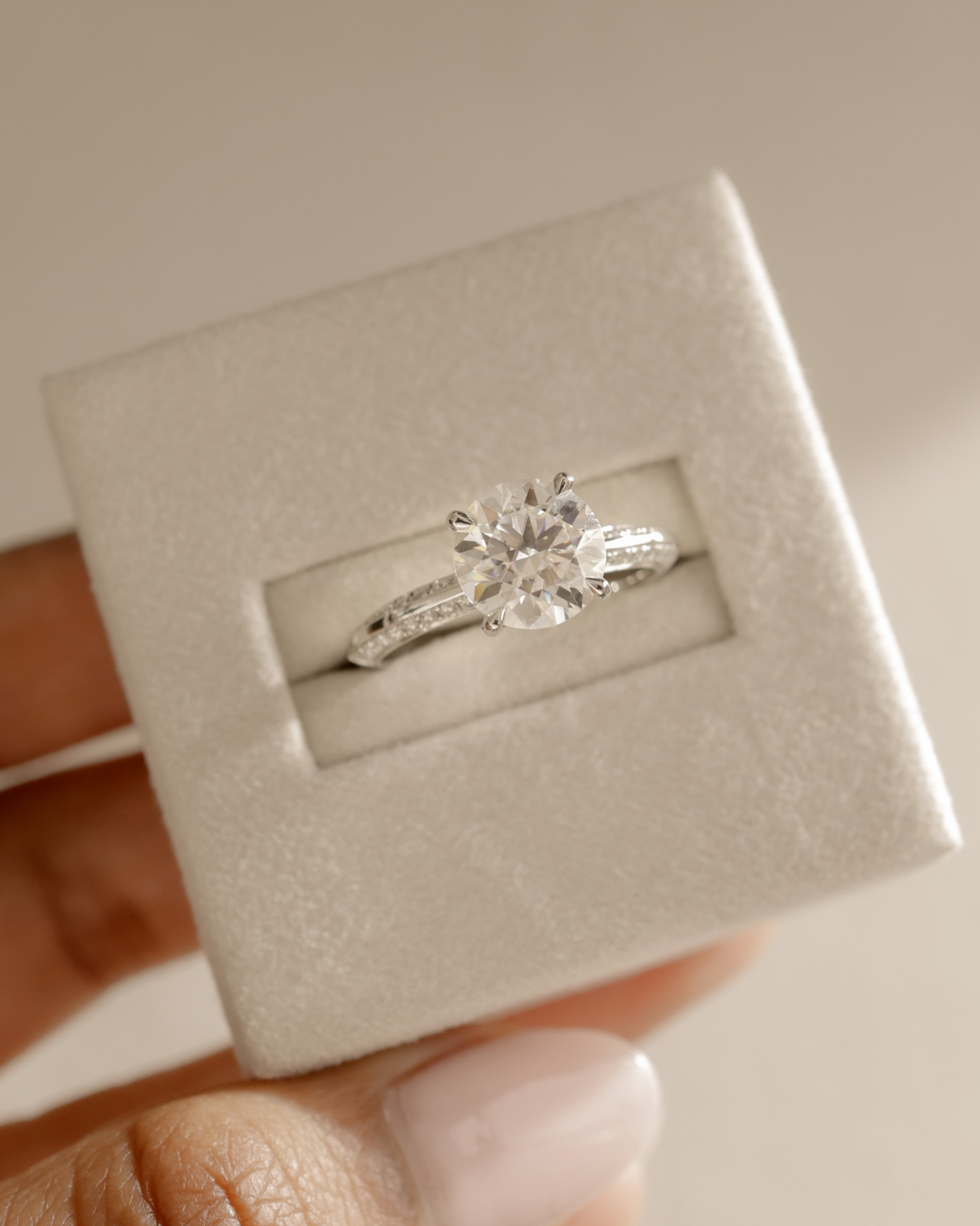 Melinda - 4 Claw Knife Edge Round Solitaire with Hidden Halo and Pav Lifestyle Image