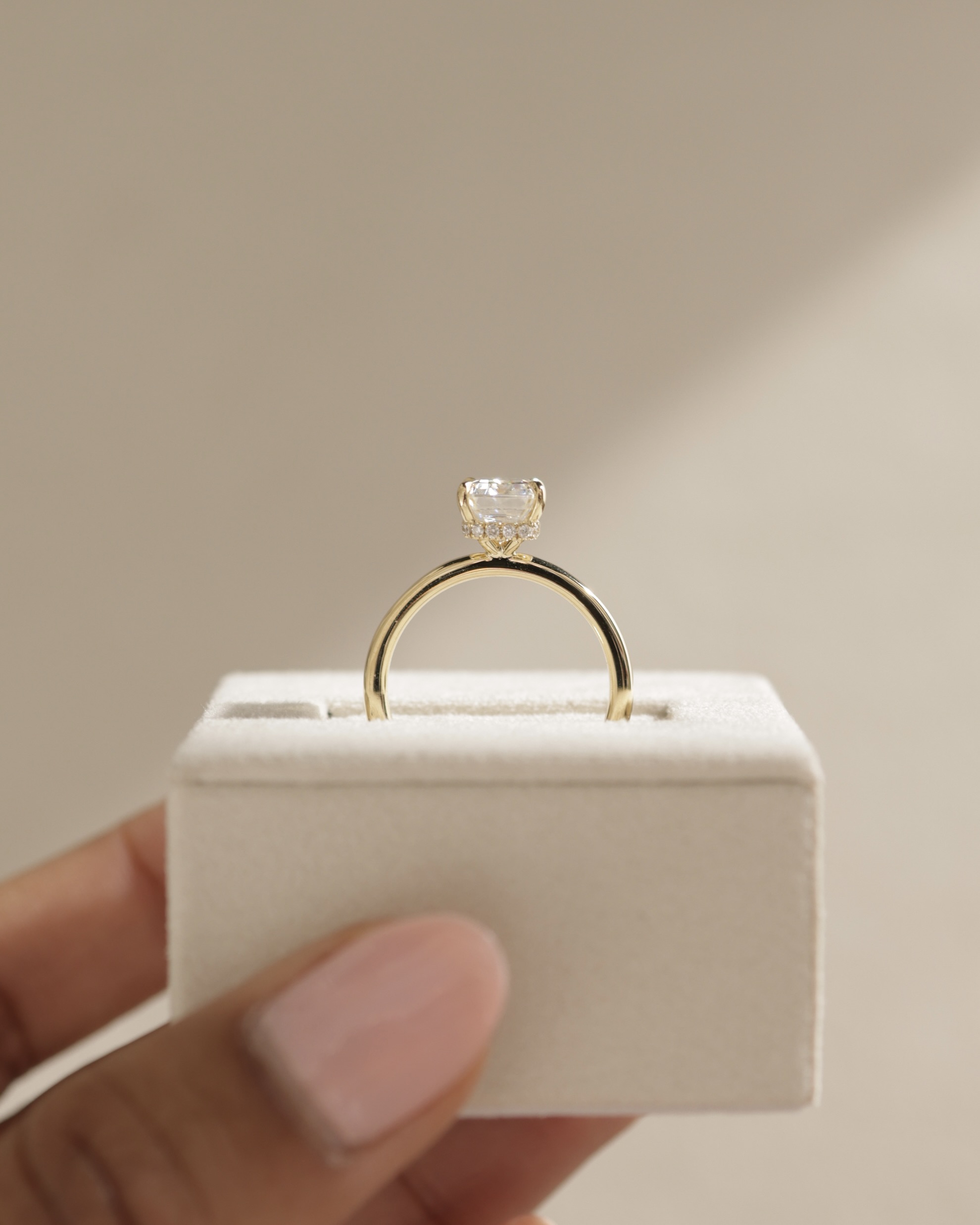 Miller - Emerald Solitaire with Hidden Halo Lifestyle Image