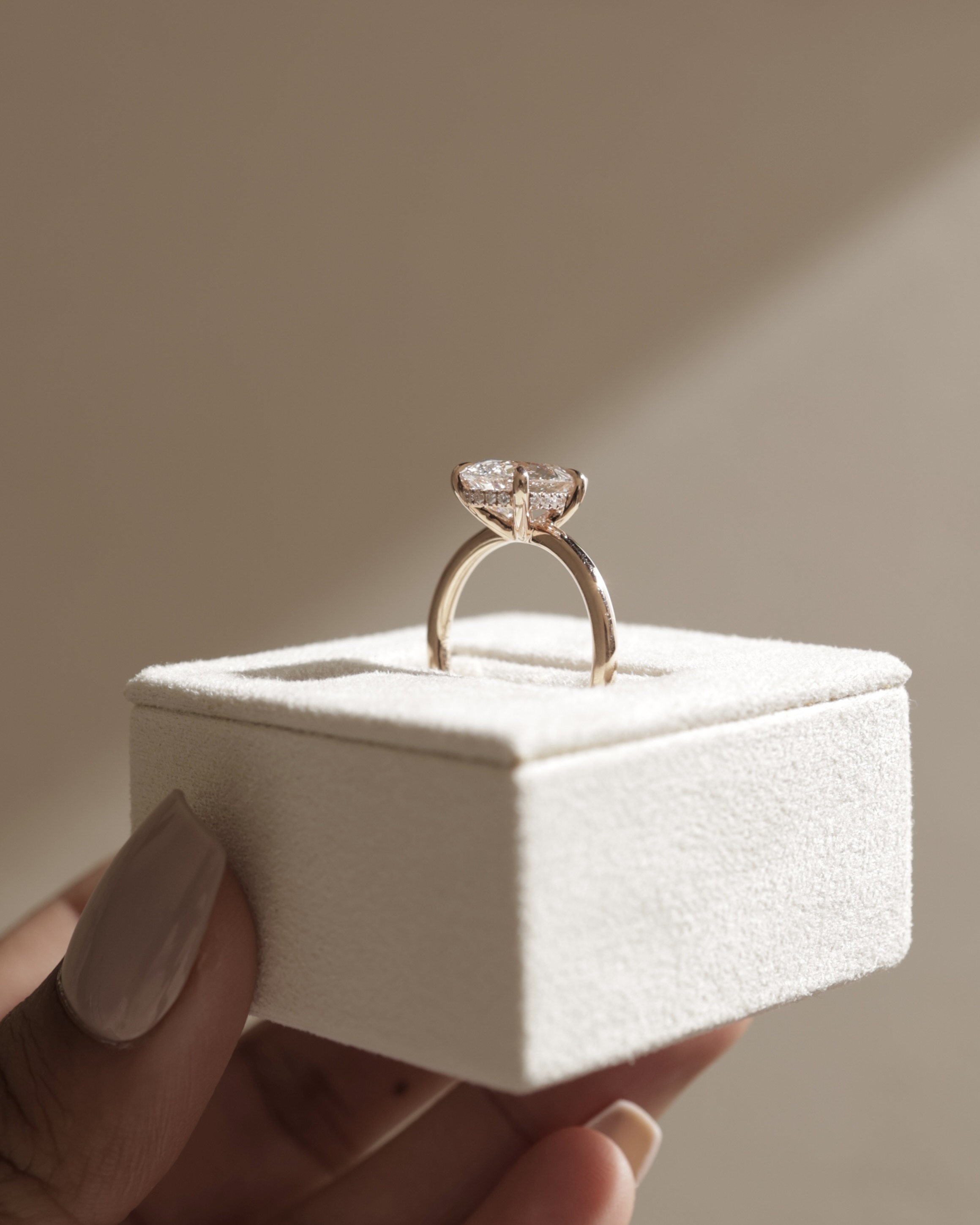 Nienna - 5 Claw Pear Solitaire with Hidden Halo Lifestyle Image