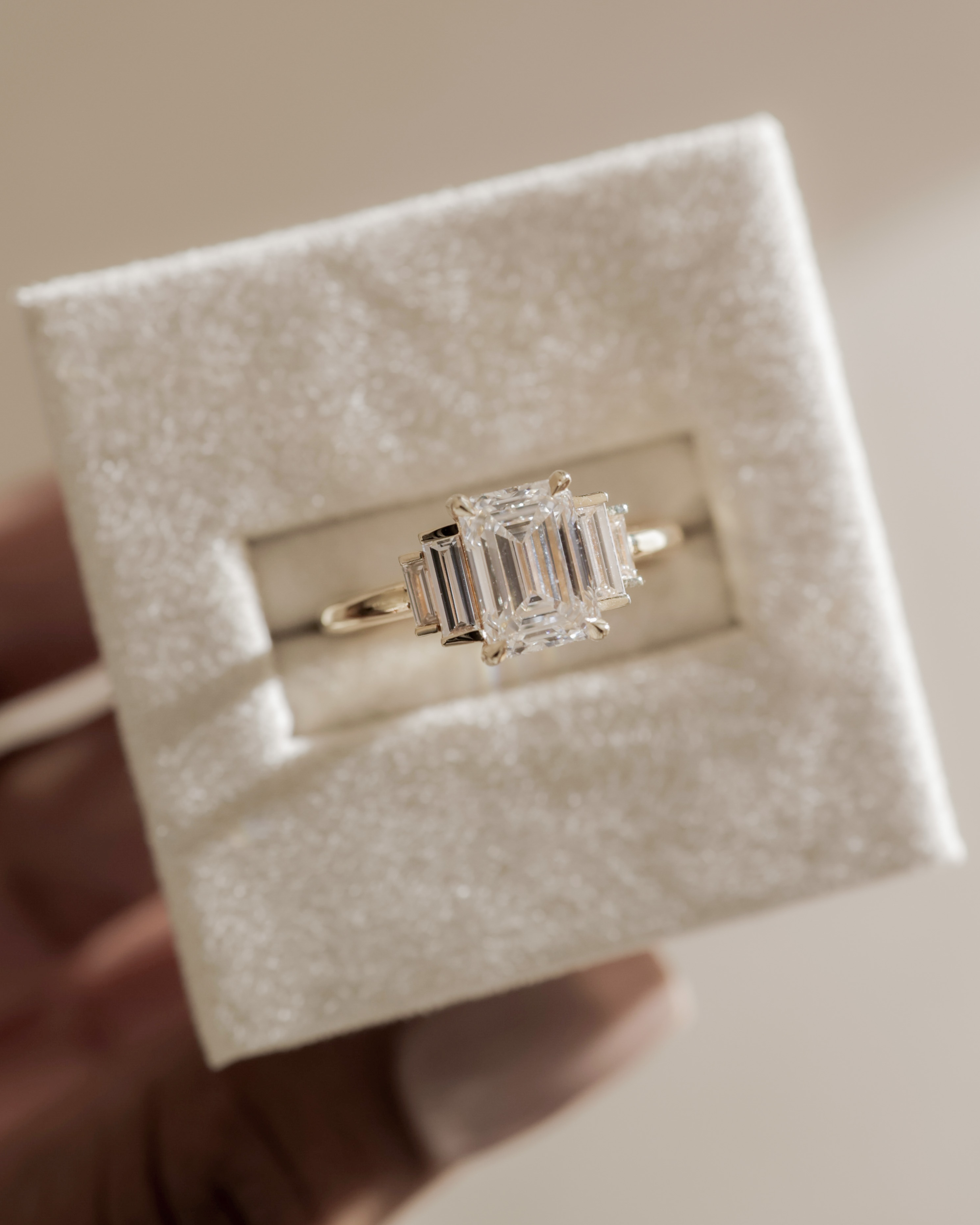 Nina - Emerald Trilogy with Baguette Side Stones Lifestyle Image