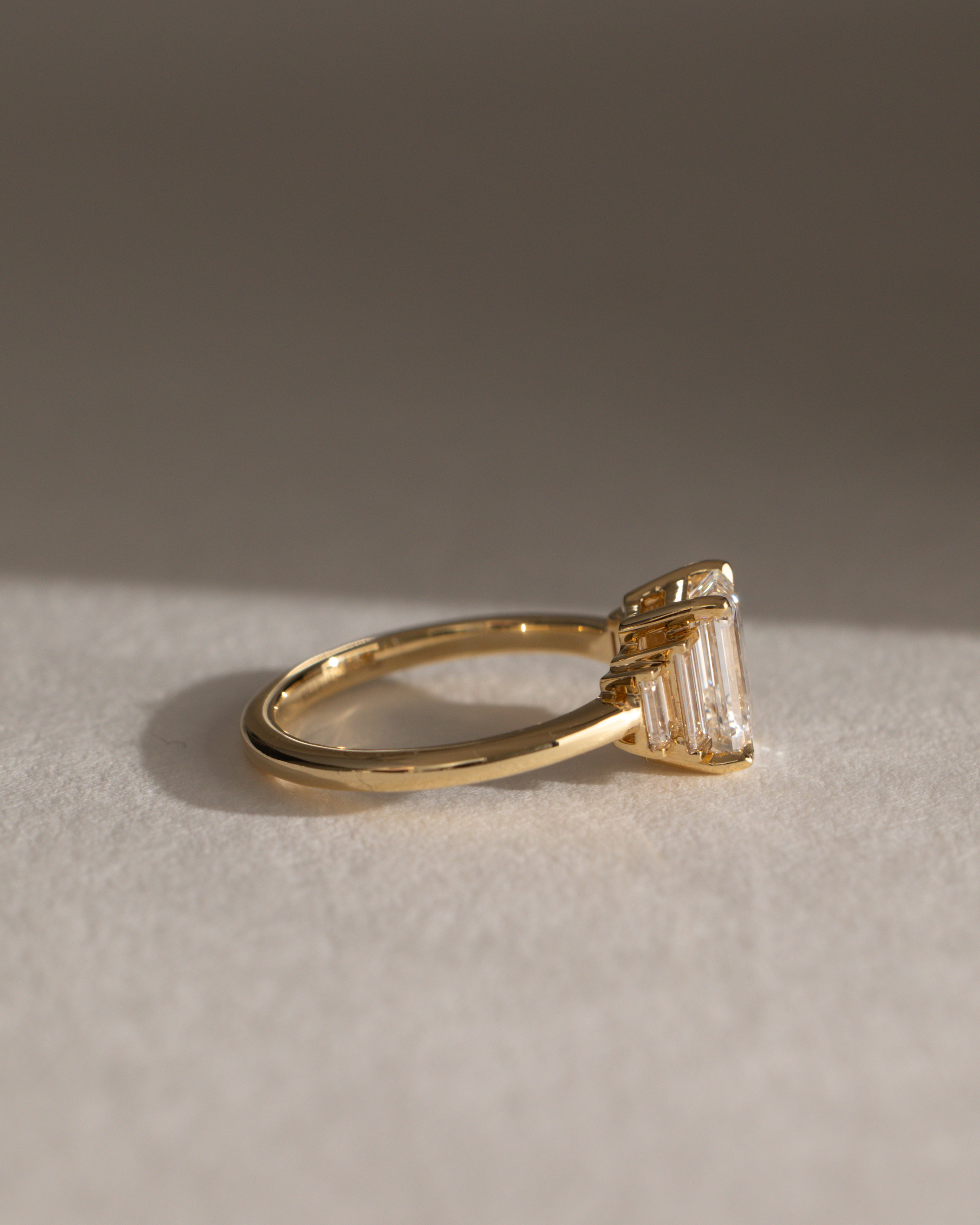 Nina - Emerald Trilogy with Baguette Side Stones Lifestyle Image