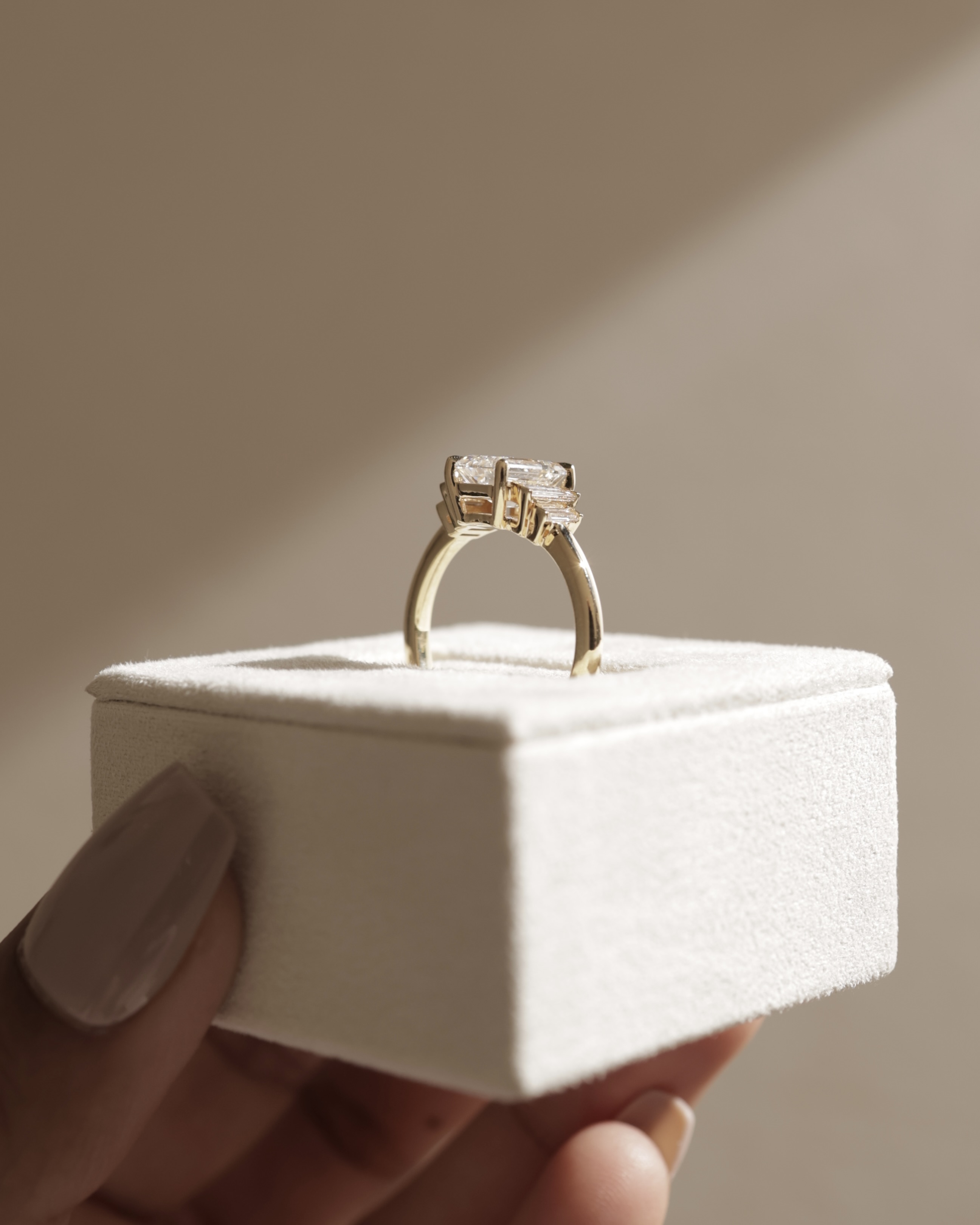 Nina - Emerald Trilogy with Baguette Side Stones Lifestyle Image