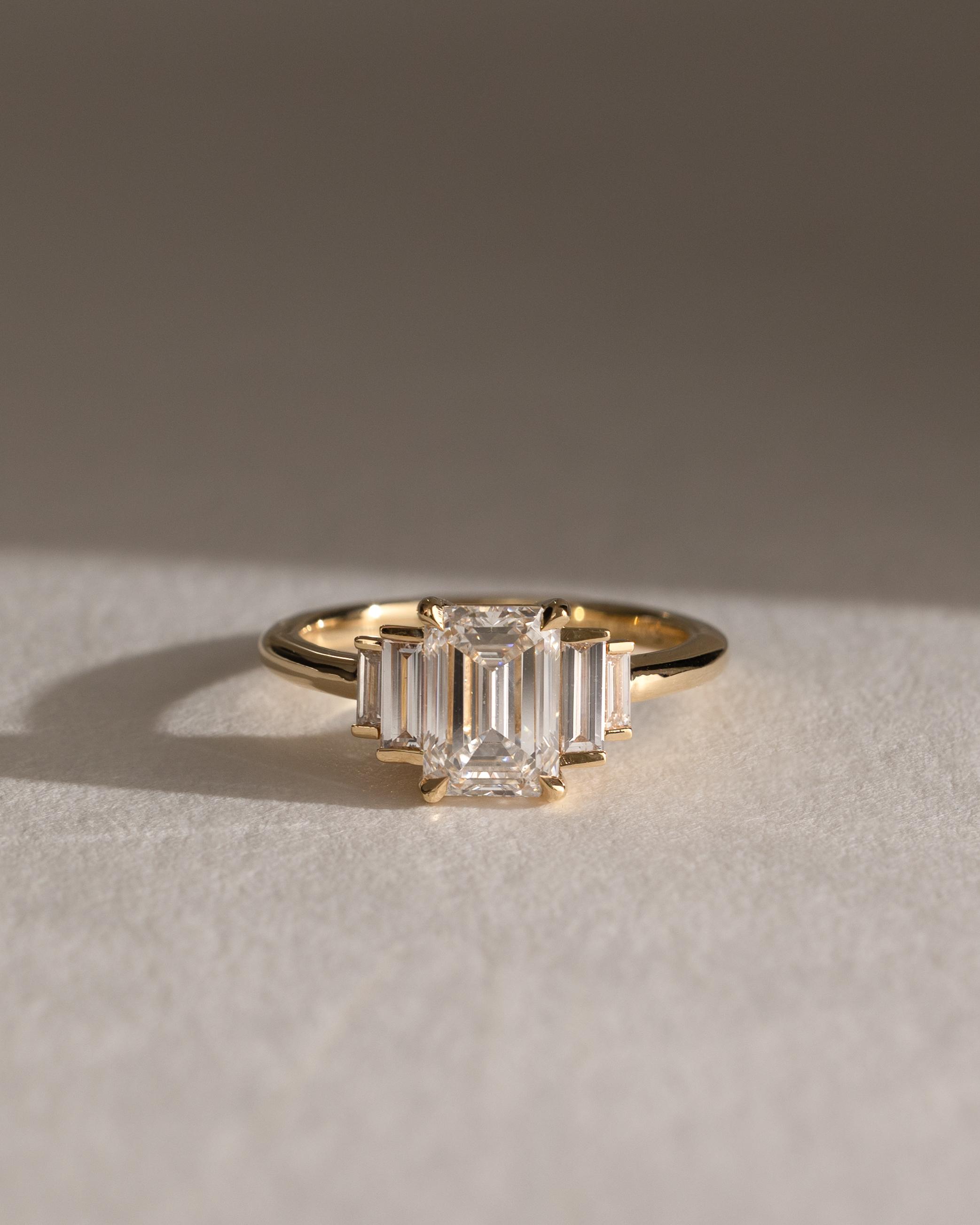 Nina - Emerald Trilogy with Baguette Side Stones Lifestyle Image