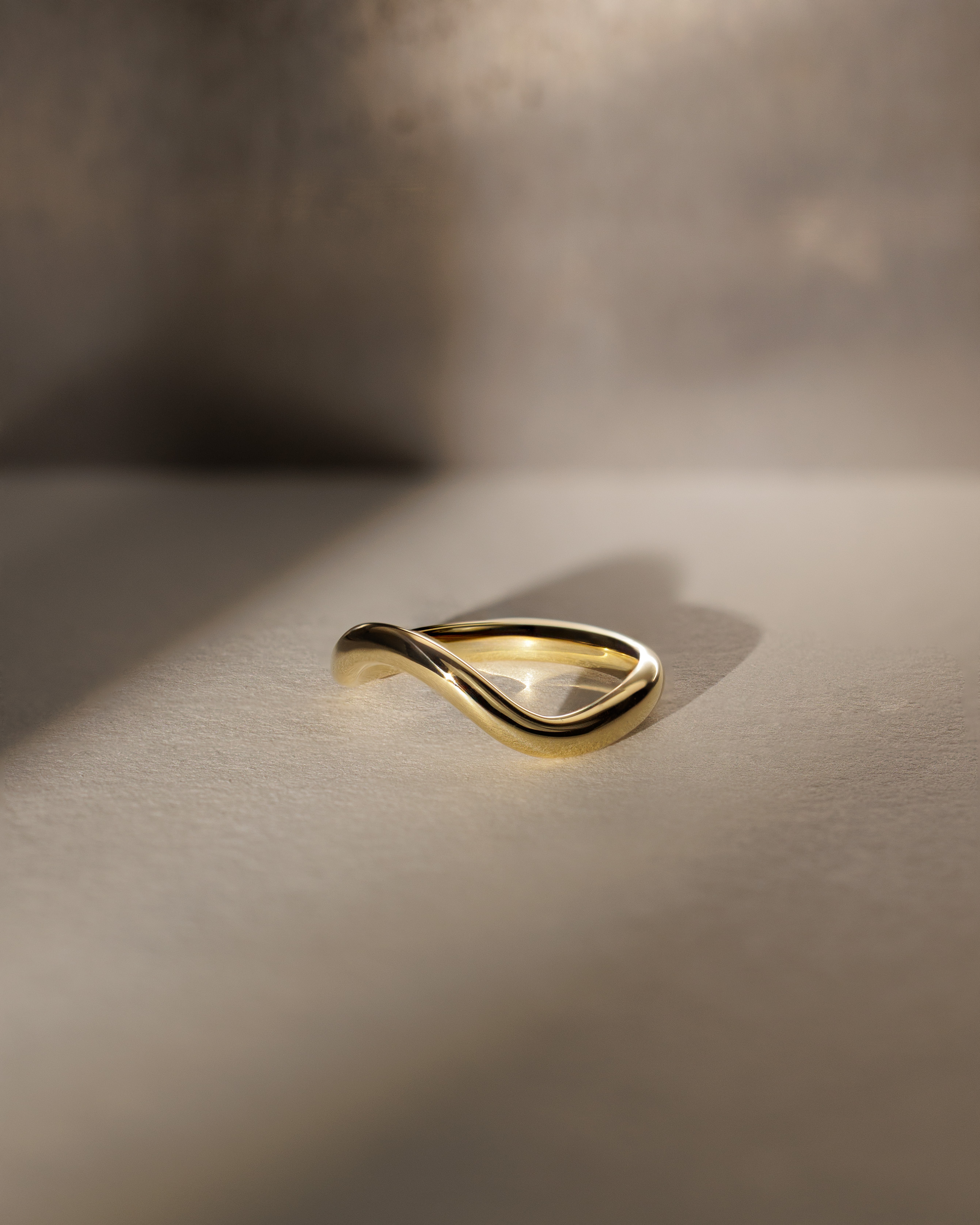 Ocea - Curved Wedding Band Lifestyle Image